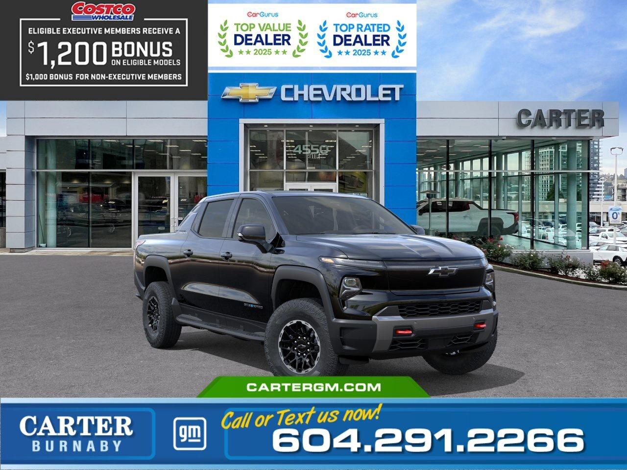 For a limited time, exclusive savings are back for Costco members! Receive a $1,200 Executive Member Bonus or a $1,000 Non-Executive Member Bonus on select models.  Experience the future of capability in this 2026 Chevrolet Silverado EV Trail Boss Max Range e4WD. Delivering up to 725 hp and 775 lb-ft of torque with Wide Open Watts, plus an impressive range of up to 769 km, this all-electric truck is built to perform. Equipped with High Stance suspension, Multi-Flex tailgate, power eTrunk, heated sport steering wheel, and advanced trailering technology, its ready for work or adventure. Innovative safety features including Side Bicyclist Alert, Rear Pedestrian Alert, Hitch Guidance, and Trailer Camera Views add confidence wherever you go. Come take it for a test drive today and experience all this stylish vehicle has to offer!  WHY CARTER GM BURNABY?  - An unrivalled vehicle purchasing experience! - Exceeding our loyal customers expectations since 1963 - 4.5 Google star rating with 2,300+ customer reviews) - CarGurus Top-Rated Dealer 2025 Award - CarGurus Top Value Dealer 2025 Award - Vehicle trades welcome! Best price guaranteed! - We provide upfront pricing, zero hidden fees, and 100% transparency - Fast approvals and 99% acceptance rates (no matter your current credit status!) - Multilingual staff (many languages spoken) - Comfortable non-pressured environment with in-store television, WIFI and a childrens play area! - In-store restaurant: fresh daily menu        Were here to help you drive the vehicle you want, the vehicle you deserve! QUESTIONS? GREAT! WEVE GOT ANSWERS! To speak with a friendly vehicle specialist - CALL NOW! The advertised price includes all standard dealer fees and any applicable manufacturer or dealer incentives. It does not include applicable taxes, licensing, insurance, or optional products or services. Dealer fees will be clearly broken out and itemized on the bill of sale, maximum total of fees $699.00. Prices are shown in Canadian dollars. While we make every effort to ensure accuracy, vehicle details, pricing, options, and availability are subject to change without notice. Please confirm all information with dealership sales management before purchase. Dealer Code: 81129