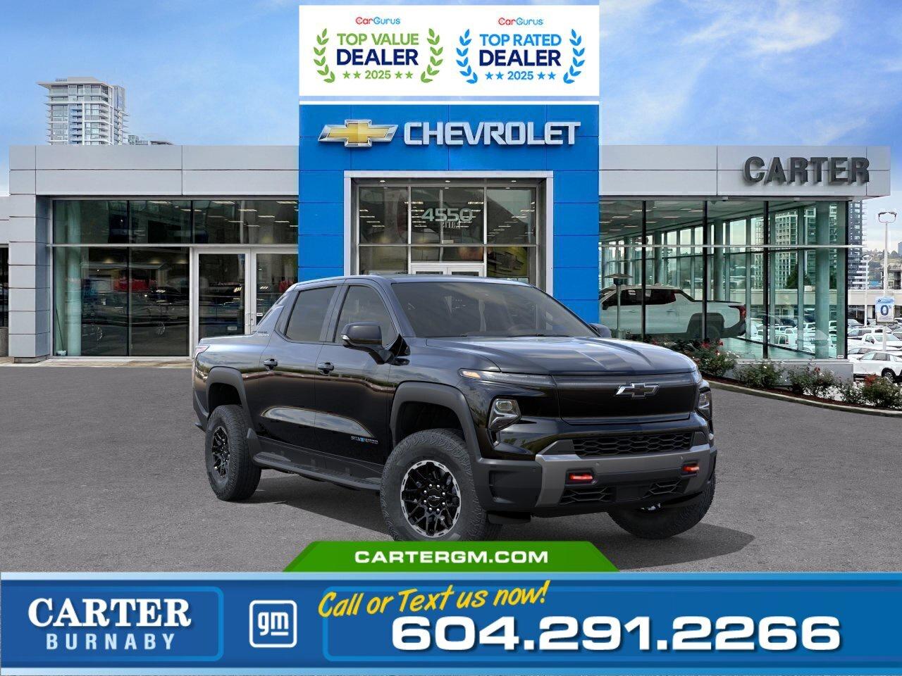 For a limited time, exclusive savings are back for Costco members! Receive a $1,200 Executive Member Bonus or a $1,000 Non-Executive Member Bonus on select models.  Experience the future of capability in this 2026 Chevrolet Silverado EV Trail Boss Max Range e4WD. Delivering up to 725 hp and 775 lb-ft of torque with Wide Open Watts, plus an impressive range of up to 769 km, this all-electric truck is built to perform. Equipped with High Stance suspension, Multi-Flex tailgate, power eTrunk, heated sport steering wheel, and advanced trailering technology, its ready for work or adventure. Innovative safety features including Side Bicyclist Alert, Rear Pedestrian Alert, Hitch Guidance, and Trailer Camera Views add confidence wherever you go. Come take it for a test drive today and experience all this stylish vehicle has to offer!  WHY CARTER GM BURNABY?  - An unrivalled vehicle purchasing experience! - Exceeding our loyal customers expectations since 1963 - 4.5 Google star rating with 2,300+ customer reviews) - CarGurus Top-Rated Dealer 2025 Award - CarGurus Top Value Dealer 2025 Award - Vehicle trades welcome! Best price guaranteed! - We provide upfront pricing, zero hidden fees, and 100% transparency - Fast approvals and 99% acceptance rates (no matter your current credit status!) - Multilingual staff (many languages spoken) - Comfortable non-pressured environment with in-store television, WIFI and a childrens play area! - In-store restaurant: fresh daily menu        Were here to help you drive the vehicle you want, the vehicle you deserve! QUESTIONS? GREAT! WEVE GOT ANSWERS! To speak with a friendly vehicle specialist - CALL NOW! The advertised price includes all standard dealer fees and any applicable manufacturer or dealer incentives. It does not include applicable taxes, licensing, insurance, or optional products or services. Dealer fees will be clearly broken out and itemized on the bill of sale, maximum total of fees $699.00. Prices are shown in Canadian dollars. While we make every effort to ensure accuracy, vehicle details, pricing, options, and availability are subject to change without notice. Please confirm all information with dealership sales management before purchase. Dealer Code: 81129