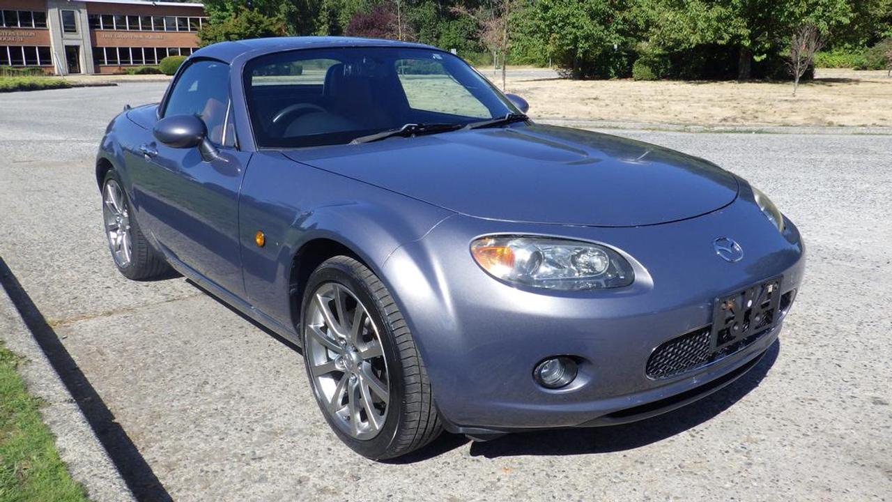 2007 Mazda Miata Roadster Right hand drive, Convertible, 2 door, automatic, air conditioning, power door locks, power windows, window lock, power mirrors, pioneer stereo system sound by Bose, paddle shifters, 12V outlet, functioning convertible hard top, silver exterior.  $8,030.00 plus $375 processing fee, $8,405.00 total payment obligation before taxes.   Listing report, warranty, contract commitment cancellation fee, financing available on approved credit (some limitations and exceptions may apply). All above specifications and information is considered to be accurate but is not guaranteed and no opinion or advice is given as to whether this item should be purchased. We do not allow test drives due to theft, fraud, acts of vandalism and undetectable impaired driving. Instead we provide the following benefits: Complimentary Warranty (with options to extend), Limited Money Back Satisfaction Guarantee on Fully Completed Contracts, Contract Commitment Cancellation, and an Open-Ended Sell-Back Option. Ask seller for details or call 604-522-REPO(7376) to confirm listing availability.