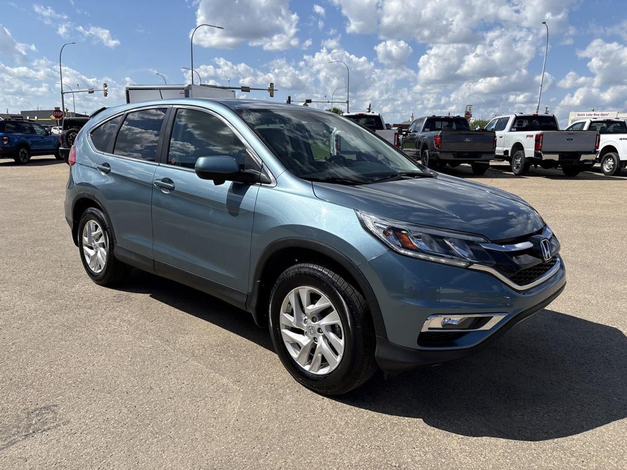 THE PRICE YOU SEE, PLUS GST. GUARANTEED!2.4 LITER ENGINE, AUTO TRANSMISSION(CVT), EX-L TRIM,  BLACK LEATHER SEATS, POWER DRIVER SEAT, PREMUIM AUDIO SYSTEM, The 2016 Honda CR-V EX-L trim with the 2.4-liter engine is a well-rounded compact SUV that emphasizes comfort, efficiency, and reliability. Powered by a 2.4-liter four-cylinder engine, it delivers a balanced combination of fuel economy and adequate power for daily driving and highway cruising. The EX-L trim elevates the CR-Vs comfort and convenience features, including leather upholstery, a power-adjustable drivers seat, a premium audio system, and a sunroof, creating a more luxurious and enjoyable driving experience. It also includes a multi-angle rearview camera, Hondas Earth Dreams technology for improved fuel efficiency, and a spacious, versatile interior with ample cargo space and rear seats that fold flat for extra cargo capacity. The CR-Vs smooth ride, user-friendly controls, and reputation for dependability make it a popular choice among small SUV buyers seeking a practical yet comfortable vehicle for commuting, family outings, and everyday errands.Do you want to know more about this vehicle, CALL, CLICK OR COME ON IN!*AMVIC Licensed Dealer; CarFax and Full Mechanical Inspection Included.