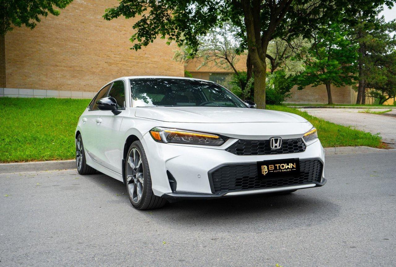 2026 Honda Civic Hybrid Sport Touring Photo2
