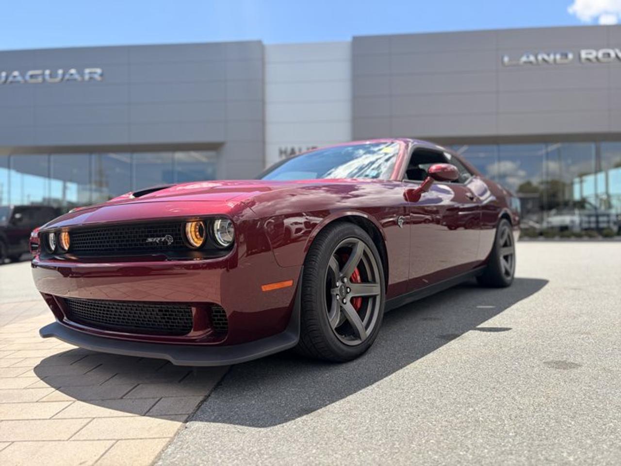 Land Rover Halifax is pleased to present this exceptional 2018 Dodge Challenger SRT Hellcat.A modern muscle car icon, the Challenger SRT Hellcat delivers unapologetic performance, bold styling, and an unmistakable presence on the road. Powered by a supercharged 6.2-litre HEMI V8 engine, the Hellcat offers extraordinary power and acceleration, creating an exhilarating driving experience that few vehicles can match.Inside, the Challenger balances classic muscle car character with modern comfort and technology. The spacious cabin features supportive performance seating, premium materials, and intuitive connectivity features, making it equally enjoyable for spirited drives and longer journeys. Every element is designed to complement the vehicles performance-focused personality while maintaining everyday usability.Its aggressive stance, wide body proportions, and distinctive Hellcat styling cues ensure it commands attention wherever it goes. From its signature hood design to its unmistakable exhaust note, this is a vehicle built to be appreciated by driving enthusiasts.*Steele Certified Pre-Owned Benefits*This 2018 Dodge Challenger SRT Hellcat is being offered fully Steele Certified for added confidence and peace of mind. Every Steele Certified vehicle undergoes a comprehensive multi-point inspection, professional reconditioning, vehicle history verification, and all required servicing prior to delivery. Flexible financing options are also available to help make ownership simple and convenient.Contact Land Rover Halifax today for additional information, a personalized video walkaround, or to arrange your test drive. We would be pleased to help you experience this remarkable Dodge Challenger SRT Hellcat firsthand.