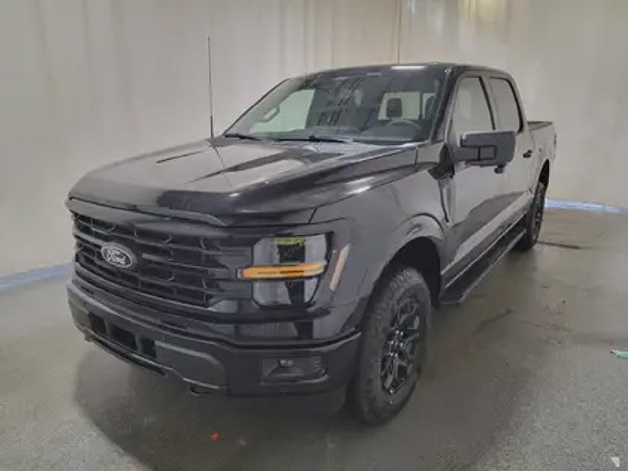 The all-new 2026 Ford F-150 XLT 302A is a statement of style in Agate Black Metallic. Powered by the 3.5L V6 engine, it delivers 400 horsepower and 500 lb-ft of torque, paired with a 10-speed automatic transmission. This truck achieves an impressive, combined fuel economy of 12.3 L/100 km (23 miles per gallon).

Key Features:
12 LCD Captivity Touchscreen
Electronic Power-Assist Steering
Dual-Zone Electronic Auto Temp Control
Cruise Control
Power Windows
AdvanceTrac® With Roll Stability Control
Perimeter Alarm
Ford Co-Pilot360
Lane Keeping System
Rear View Camera
Rear Parking Sensors
Reverse Park Assist
Class IV Trailer Hitch
Power Drivers Seat
Remote Start
SYNC®4
Apple Car Play
18 All Terrain Tires
Bluetooth Connectivity
XLT Black Appearance Package
Engine Block Heater
FX4 Off Road Package

This vehicle comes with the All-Weather Packageready to take on any season! Snow, rain, mud, or sunshinethis vehicle is built for it all! The All-Weather Package adds extra protection where it matters most, with premium mud flaps to shield your paint from road debris, all-weather floor mats to protect your interior from lifes messes, and Xpel paint protection to help guard against those infuriating rock chips. Drive with confidence, knowing your investment is protected from Reginas elements.

Bennett Dunlop Ford, proudly serving Regina for over 40 years, is conveniently located at 770 Broad Street. With over 3,500 Google reviews, our reputation reflects our commitment to providing a fast, easy, and enjoyable vehicle-buying experience. We eliminate the hassle with no admin or documentation fees, transparent upfront pricing that lets you shop with total confidence. But were more than just a dealershipwere driven to make a difference by supporting local community initiatives and events that matter to you. Visit Bennett Dunlop Ford today and experience why were Reginas trusted choice for quality vehicles, exceptional service, and a genuine commitment to driving change in our community!