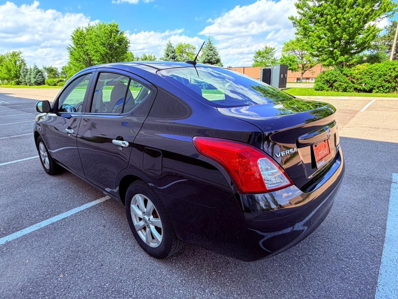 2012 Nissan Versa 1.6 S 4dr Sedan (1.6L 4cyl 5M) Photo