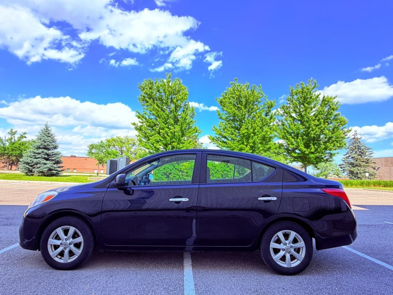 2012 Nissan Versa 1.6 S 4dr Sedan (1.6L 4cyl 5M) Photo