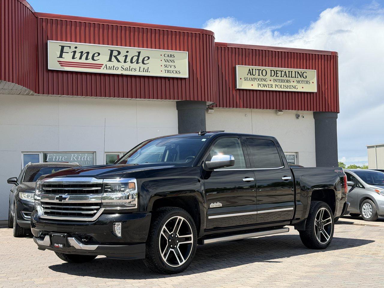 <p>2017 Chevrolet Silverado 1500 High Country Crew Cab 4X4</p><p>5.3LTR V8<br>A/C<br>Telescopic tilt steering<br>Cruise<br>Power windows<br>Power locks<br>Power mirrors<br>Power seats<br>Heated & air-conditioned front seats<br>Power sliding rear window<br>5 passengers<br>AM/FM radio<br>MY LINK  /  Bluetooth<br>215,000 HIGHWAY kms!<br>Factory remote start<br>Power step bars<br>Locking tailgate<br>Back up camera<br>Front & rear parking sensors<br>Spray in box liner<br>22 aluminum wheels<br>5.5ft box<br>Fog lights<br>Sunroof</p><p>GVW: 7,200LBS<br>Gear ratio: 3.42<br>Transmission: 8 speed, 8L90<br>Towing: Approximately 9,300LBS</p><p>$25,975 Safetied<br>Financing and Warranty Available at Fine Ride Auto Sales Ltd<br>www.FineRideAutoSales.ca</p><p>Call: 204-415-3300 or 1-855-854-3300<br>Text: 204-226-1790<br>View in person at: Unit 3-3000 Main Street</p><p>DLR# 4614<br>**Plus applicable taxes**</p><p></p><p style=text-align:center;><span style=color:#000000;><i><span style=font-family:book antiqua, palatino, serif;font-size:14pt;><strong>***NEW SUMMER HOURS EFFECTIVE MAY 15, 2026***</strong></span></i></span></p><p style=text-align:center;><span style=color:#000000;><span style=font-family:book antiqua, palatino, serif;font-size:14pt;>Monday                9am to 6pm</span></span><br><span style=color:#000000;><span style=font-family:book antiqua, palatino, serif;font-size:14pt;>Tuesday               9am to 6pm</span></span><br><span style=color:#000000;><span style=font-family:book antiqua, palatino, serif;font-size:14pt;>Wednesday               9am to 8pm</span></span><br><span style=color:#000000;><span style=font-family:book antiqua, palatino, serif;font-size:14pt;>Thursday                9am to 6pm</span></span><br><span style=color:#000000;><span style=font-family:book antiqua, palatino, serif;font-size:14pt;>Friday                9am to 6pm</span></span><br><span style=color:#000000;><span style=font-family:book antiqua, palatino, serif;font-size:14pt;>Saturday                               CLOSED</span></span><br><span style=color:#000000;><span style=font-family:book antiqua, palatino, serif;font-size:14pt;>Sunday                                 CLOSED</span></span></p>