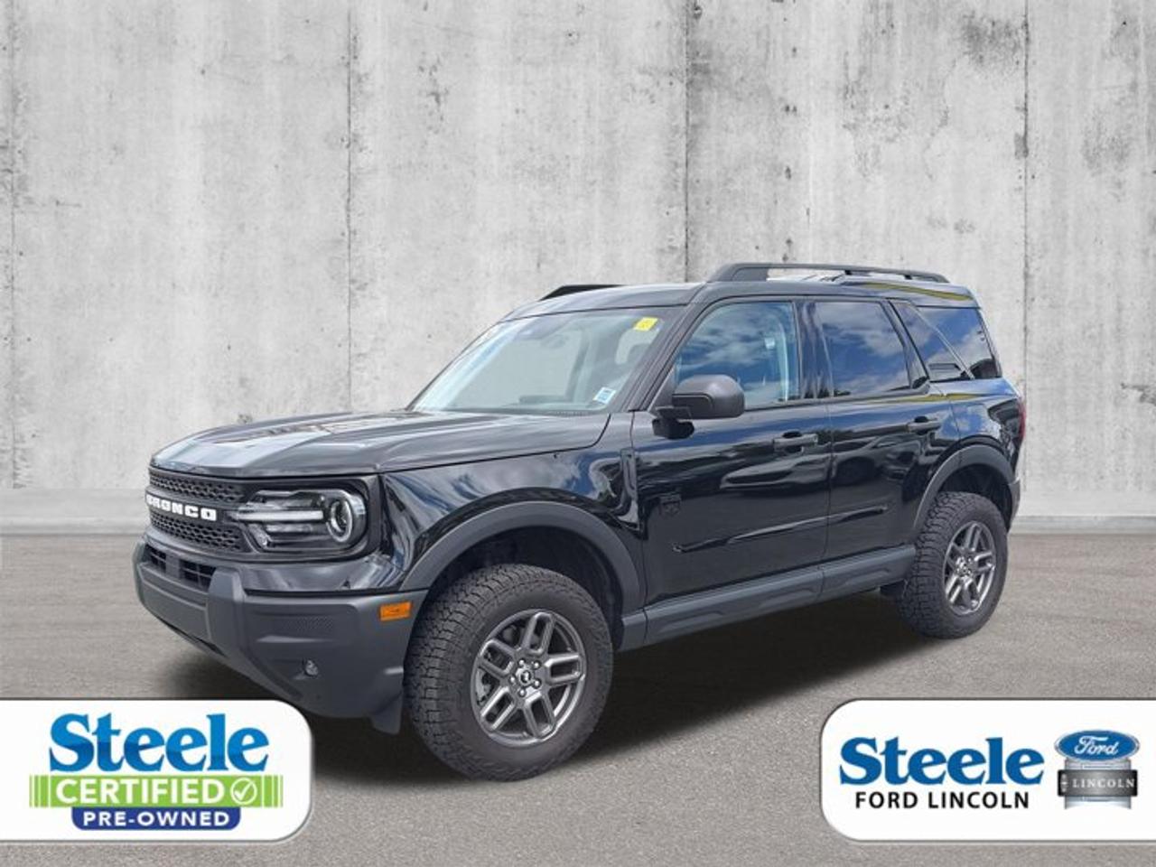 Just Arrived! 2025 Ford Bronco Sport Big Bend 4X4 For Sale In Halifax, NSAre you searching for a rugged, modern, adventure-ready used SUV for sale in Halifax? This exceptionally clean, Shadow Black 2025 Ford Bronco Sport Big Bend is officially available on our lot at Steele Ford Lincoln. Combining retro off-road heritage with an upscale cabin, cutting-edge tech, and excellent fuel consciousness, this 4X4 utility vehicle is the ultimate daily driver for life in Atlantic Canada.Under the hood, this vehicle is powered by a highly responsive 1.5L Intercooled Turbo 3-Cylinder engine. Mated to a smooth-shifting automatic transmission and an advanced 4X4 traction network, it effortlessly manages daily city commutes, tight parking spots, and heavy Atlantic winter storms with absolute poise and composure.Certified Mechanical Inspection & Service Completed:We put this vehicle through our state-of-the-art service department to guarantee flawless mechanical performance, crisp operation, and total safety. The following professional work has been completed:Brand New Nova Scotia MVI: Fully passed our shop safety checks with a fresh provincial Motor Vehicle Inspection sticker applied before hitting the lot.Engine Service: Fresh engine oil change and a brand-new factory-approved engine oil filter installed.Multi-Point Inspection: Completed a thorough bumper-to-bumper check, topped up all vital fluid levels, balanced all tire pressures to exact factory specification, and fully lubricated all doors and locks.Why Buy This 2025 Ford Bronco Sport Big Bend 4X4?Steele Certified Pre-Owned: Rest easy knowing this off-road crossover is not sold As-Is. It qualifies for full, premium Steele Certification, passing rigorous multi-point quality standards for ultimate peace of mind.Incredibly Low Mileage: This late-model SUV has barely been driven and presents in like-new showroom condition, promising years of trouble-free ownership.Upgraded Premium Interior: Packed with upscale amenities, featuring Light Smoked Truffle premium leather-trimmed heated and ventilated front captains chairs.Turn-Key Ready: Fully serviced, detailed, provincially safety-inspected, and 100% ready to be driven home today!Get Fast Auto Financing Approval in Halifax:At Steele Ford Lincoln, we make buying a pre-owned vehicle stress-free. Take advantage of our 99% Guaranteed Auto Loan Approval program, specifically designed to assist buyers looking for subprime financing, good credit car loans, bad credit solutions, or first-time buyer programs. We accept all trade-ins to lower your monthly payments instantly!Late-model premium Bronco Sports with ultra-low mileage move incredibly fast in the Atlantic provinces. Visit Steele Ford Lincoln at 3773 Windsor Street, Halifax, NS, B3K 5M2, or call our sales team directly at 902 453-1130 to book your test drive today!