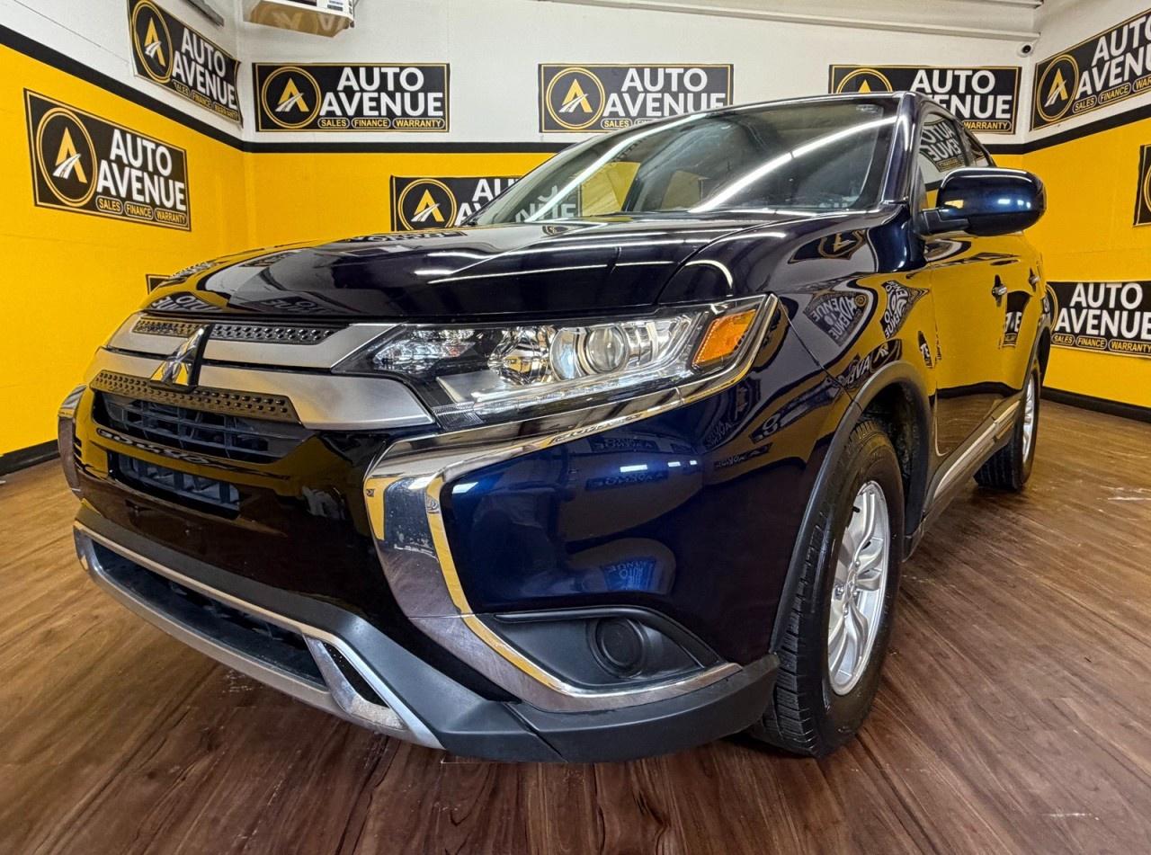 This outstanding example of a 2019 Mitsubishi Outlander ES Premium is proudly offered by Auto Avenue Airdrie. <br/> Designed to meet the needs of modern families, the Mitsubishi Outlander ES Premium delivers the perfect combination of versatility, comfort, and capability. With its spacious interior, refined styling, and practical design, this SUV is equally at home on daily commutes, family road trips, and weekend adventures. <br/> Equipped with heated seats and a backup camera, this Outlander provides the comfort and convenience drivers appreciate throughout every season. Thoughtfully designed features help enhance your driving experience, while the spacious cabin offers plenty of room for passengers and cargo alike. <br/> With the added confidence of 4WD, this Outlander is prepared to tackle changing road conditions with ease. Whether youre navigating city streets, highway miles, or Alberta winters, youll enjoy the stability, traction, and peace of mind that come with Mitsubishis capable drivetrain. <br/> Combining reliability, practicality, and exceptional value, this Mitsubishi Outlander ES Premium is an excellent choice for drivers seeking a dependable SUV that doesnt compromise on comfort or capability. <br/> AUTO AVENUE IS AN AMVIC LICENSED DEALERSHIP, COMMITTED TO PROVIDING EXCEPTIONAL SERVICE AND QUALITY VEHICLES WITH FLEXIBLE PAYMENT OPTIONS. <br/>