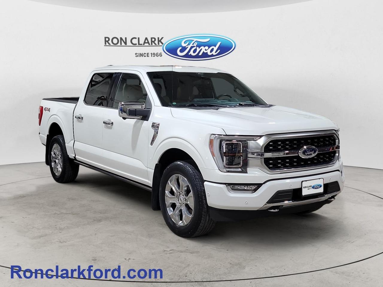 One Owner, Purchased In-House! This exceptionally well-equipped 2021 Ford F-150 Platinum 4x4 is finished in stunning Star White Metallic Tri-Coat and features a luxurious Carmelo leather-trimmed interior. Powered by the sought-after 3.5L EcoBoost® V6 engine paired with a 10-speed automatic transmission, this F-150 delivers outstanding performance, capability, and refinement.Equipped with the premium 701A Equipment Group, this Platinum is loaded with features designed for comfort and convenience. Highlights include power-deployable running boards, a power tailgate, power sliding rear window, and a panoramic twin-panel moonroof that creates an open, spacious feel throughout the cabin.Inside, youll find heated, ventilated, and memory-equipped power front seats, heated rear seats, and a premium B&O sound system. Stay connected with Fords latest SYNC® 4 infotainment system featuring a 12-inch touchscreen, offering seamless access to navigation, media, and smartphone integration.Ready for work or play, this F-150 comes equipped with the Trailer Tow Package and an integrated trailer brake controller for confident towing. Additional features include Reverse Brake Assist, remote keyless entry, and a host of advanced technologies that make every drive safer and more enjoyable.Combining luxury, technology, and legendary F-150 capability, this truck is ready for its next adventure.All Pre-Owned vehicles come standard with one key. If we received additional keys from the previous owner they will be with the vehicle upon delivery at no cost. Additional keys may be purchased at customers request and expense.Come to the dealer you can trust. 60 years and counting Ron Clark Ford & Jayco RV is known for great value and being best in customer service! We serve and deliver all over Ontario including destinations such as Wyoming, Petrolia, Sarnia, London, Guelph, Kitchener-Waterloo, Hamilton, GTA, Ottawa & Chatham-Kent. Call or visit us at RON CLARK FORD & JAYCO RV to view and test drive today! RON CLARK FORD where else!!