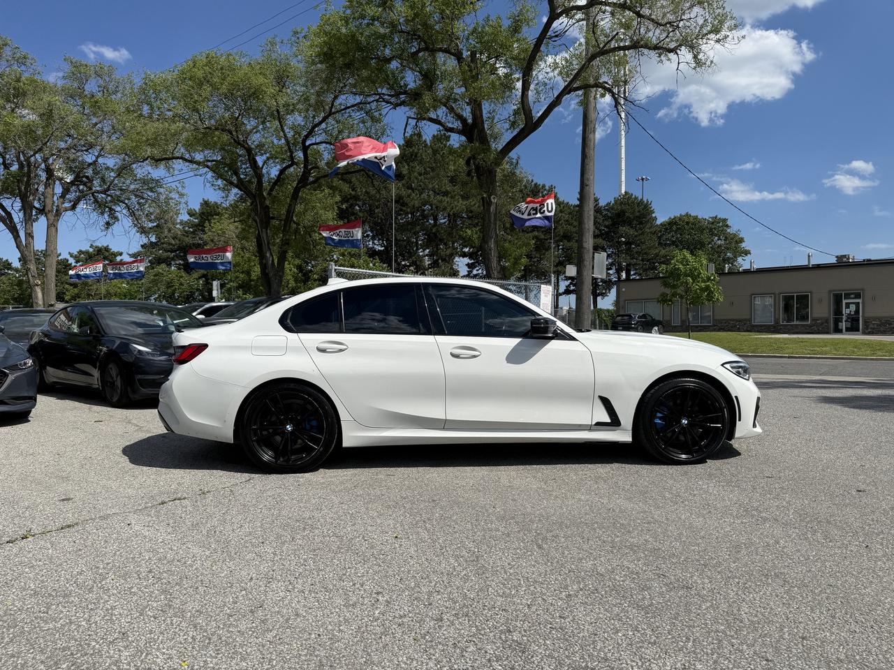 2022 BMW 330i xDrive M-Sport l xDrive l 2.0L l 4Cyl l 255HP l BSM l LDW Photo