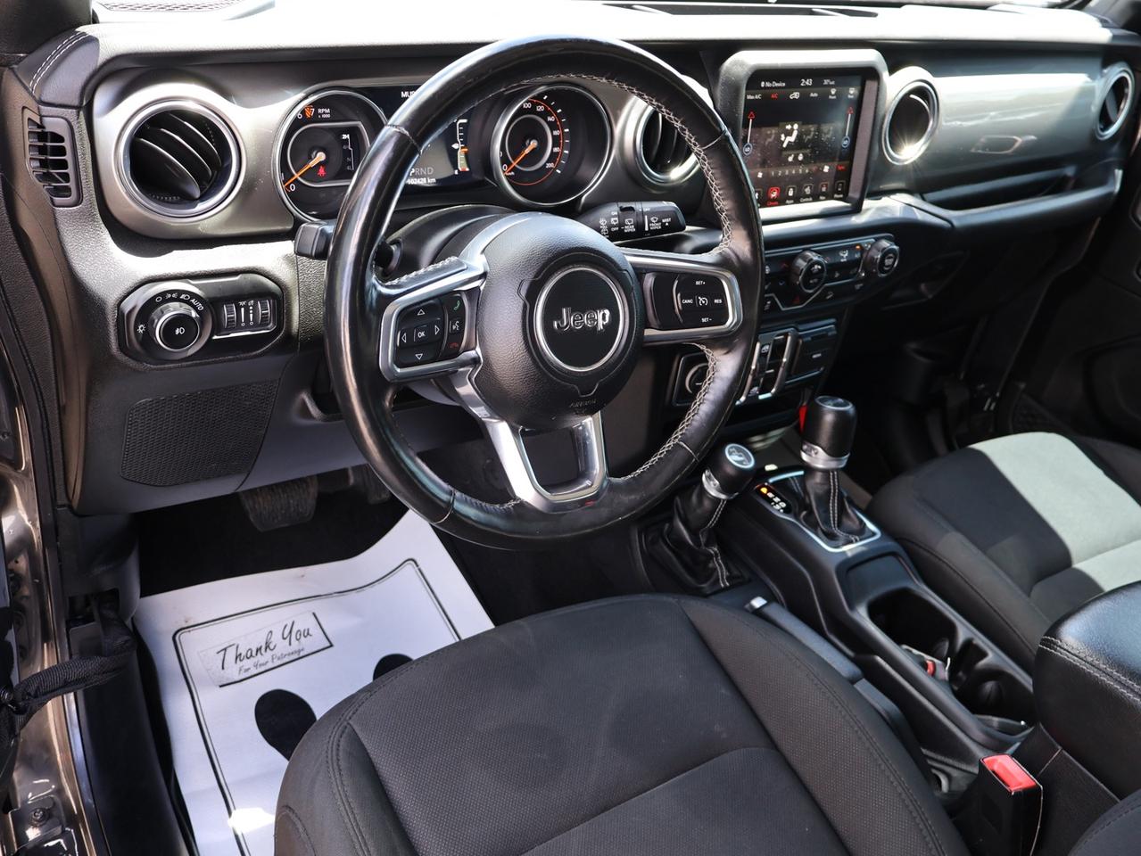 2019 Jeep Wrangler V6 UNLIMITED SAHARA 4WD CERTIFIED *SERVICE RECORDS* CAMERA NAV BLUETOOTH HEATED SEATS CRUISE ALLOYS Photo