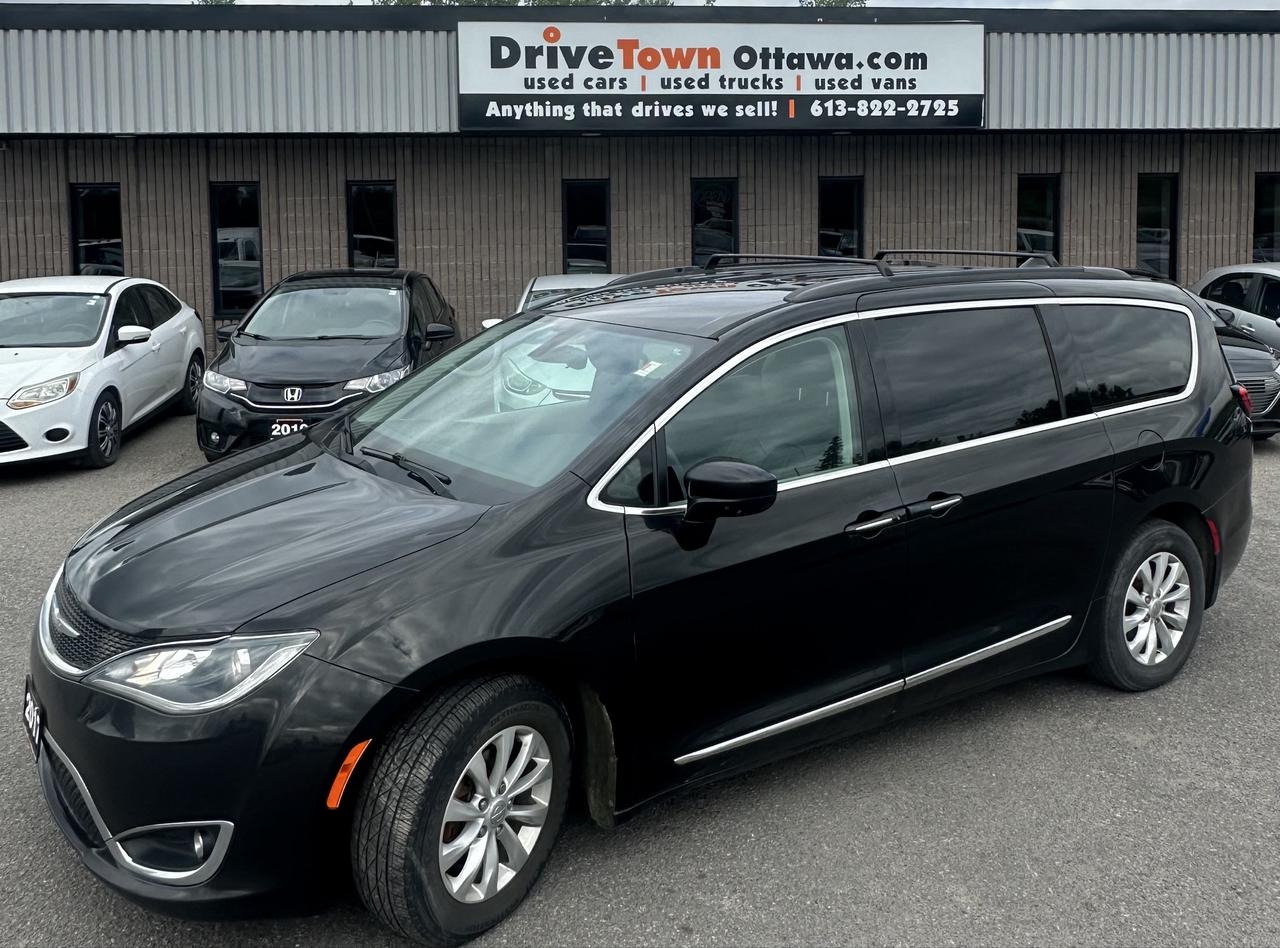 <html>
<p>2017 CHRYSLER PACIFICA - SPACIOUS FAMILY MINIVAN, COMFORTABLE INTERIOR WITH THREE-ROW SEATING, BLUETOOTH, AND BACKUP CAMERA - GREAT COMMUTER VEHICLE AND SMOOTH DRIVE - EQUIPPED WITH LEATHER SEATS, HEATED SEATS, POWER SLIDING DOORS, PARKING SENSORS AND MORE!</p>
<p>EASY FINANCING AVAILABLE! </p>
<br>
<p>GET PRE-APPROVED NOW AT DRIVETOWNOTTAWA.COM.</p>
<p>ADVERTISED PRICE IS OUR FINANCE PRICE!</p>
<p>DRIVETOWNOTTAWA.COM – COME VISIT US / VENEZ NOUS VISITER! TAXES AND LICENSING EXTRA. SEE DRIVETOWNOTTAWA.COM FOR CASH PRICE, FINANCING CHARGES APPLY (BANK FEES, PPSA, INTEREST). QUEBEC SAFETY FEE APPLICABLE.</p>
</html>