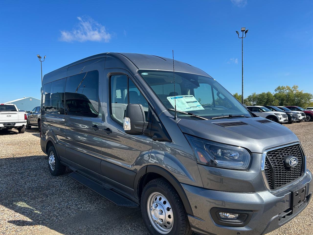 2026 Ford Transit Passenger Wagon XLT T-350 148 Med Roof  AWD 302A Photo