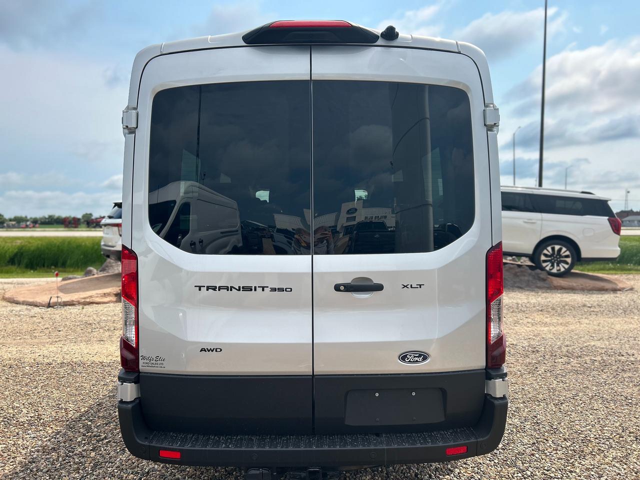2026 Ford Transit Passenger Wagon XLT T-350 148 Med Roof  AWD 302A Photo4