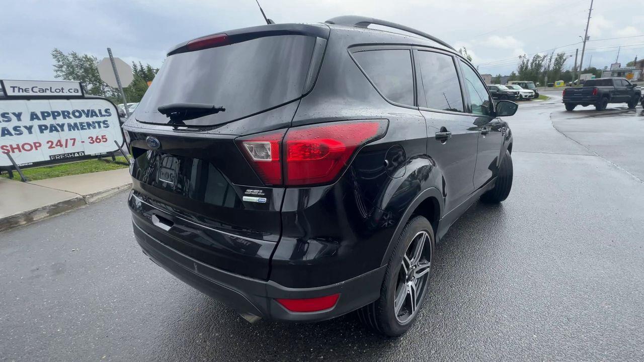 2019 Ford Escape SEL AWD, HEATED LEATHER SEATS, BACK UP CAM, NAV, POWER LIFTGATE!! Photo