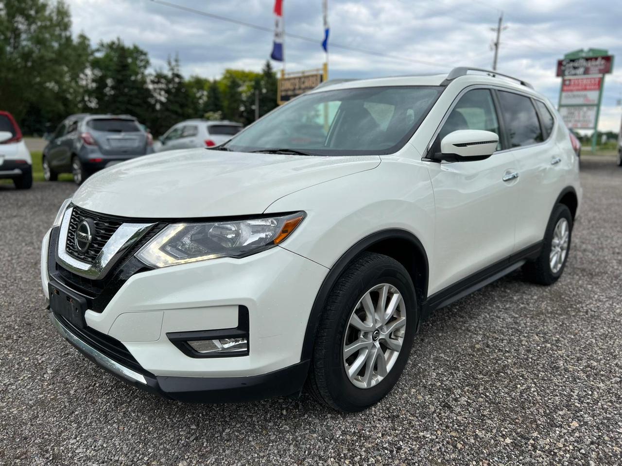 <p>CERTIFIED,</p><p>We finance</p><p>Contact us for pre approval,</p><p>DINOS CARS</p><p>-Safety certification included in the price ( UNLESS SPECIFIED OTHERWISE ie. AS IS VEHICLES)</p><p>-IF YOU CANT COME TO US WELL DRIVE TO YOU ( WITHIN A REASONABLE DISTANCE TO VIEW) DELIVERY ALSO AVAILABLE</p><p>-Certified Quality Pre owned Vehicles</p><p>-Carfax history report available for every vehicle</p><p>-Licensing and tax are extra</p><p>-Open by Appointment Call or text(519)697-3866</p><p>-4016 Dundas St E, London, ON N5V 5C6</p><p>Looking for a reliable and versatile SUV thats ready for all your Canadian adventures? Dinos Cars is thrilled to present this stunning white 2018 Nissan Rogue SV CERTIFIED. With its sleek exterior and comfortable black interior, this Rogue is designed to impress and perform. Whether youre navigating city streets or venturing off the beaten path, the all-wheel-drive system offers confidence and control in any weather condition. The spacious SUV/Crossover body style provides ample room for passengers and cargo, making it the perfect companion for family road trips, weekend getaways, or simply tackling your daily commute with ease.</p><p>This 2018 Nissan Rogue SV CERTIFIED, boasting just 129,378 kilometers, is a fantastic opportunity to own a well-equipped and dependable vehicle. The smooth Variable Transmission ensures an efficient and enjoyable driving experience, while the four-door configuration makes access convenient for everyone. Driven by gasoline and built for everyday life, this Rogue is poised to be a smart choice for discerning drivers who value practicality and a touch of sophistication.</p><p>Here are 5 of the most sizzling features of this 2018 Nissan Rogue SV CERTIFIED:</p><ul><li><strong>All-Wheel Drive Confidence:</strong> Conquer Canadian winters and unpredictable roads with the intelligent All-Wheel Drive system, offering enhanced traction and stability when you need it most.</li><li><strong>CERTIFIED Peace of Mind:</strong> Drive away with confidence knowing this Rogue has undergone a rigorous certification process, ensuring its quality and reliability.</li><li><strong>Spacious & Versatile SUV/Crossover:</strong> Enjoy the freedom of ample passenger space and flexible cargo capacity, perfect for everything from grocery runs to weekend escapes.</li><li><strong>Sleek White Exterior:</strong> Turn heads with the classic and clean white exterior, a timeless choice that complements the Rogues modern design.</li><li><strong>Smooth & Efficient CVT:</strong> Experience a seamless and fuel-efficient drive thanks to the advanced Variable Transmission, optimizing performance for every journey.</li></ul><p><strong><em>Powered by AutoIntelligence&trade;</em></strong></p><p>Vehicle information has been generated using artificial intelligence and is provided for informational purposes only. While efforts are made to ensure accuracy, please confirm all details directly with the dealer.</p>