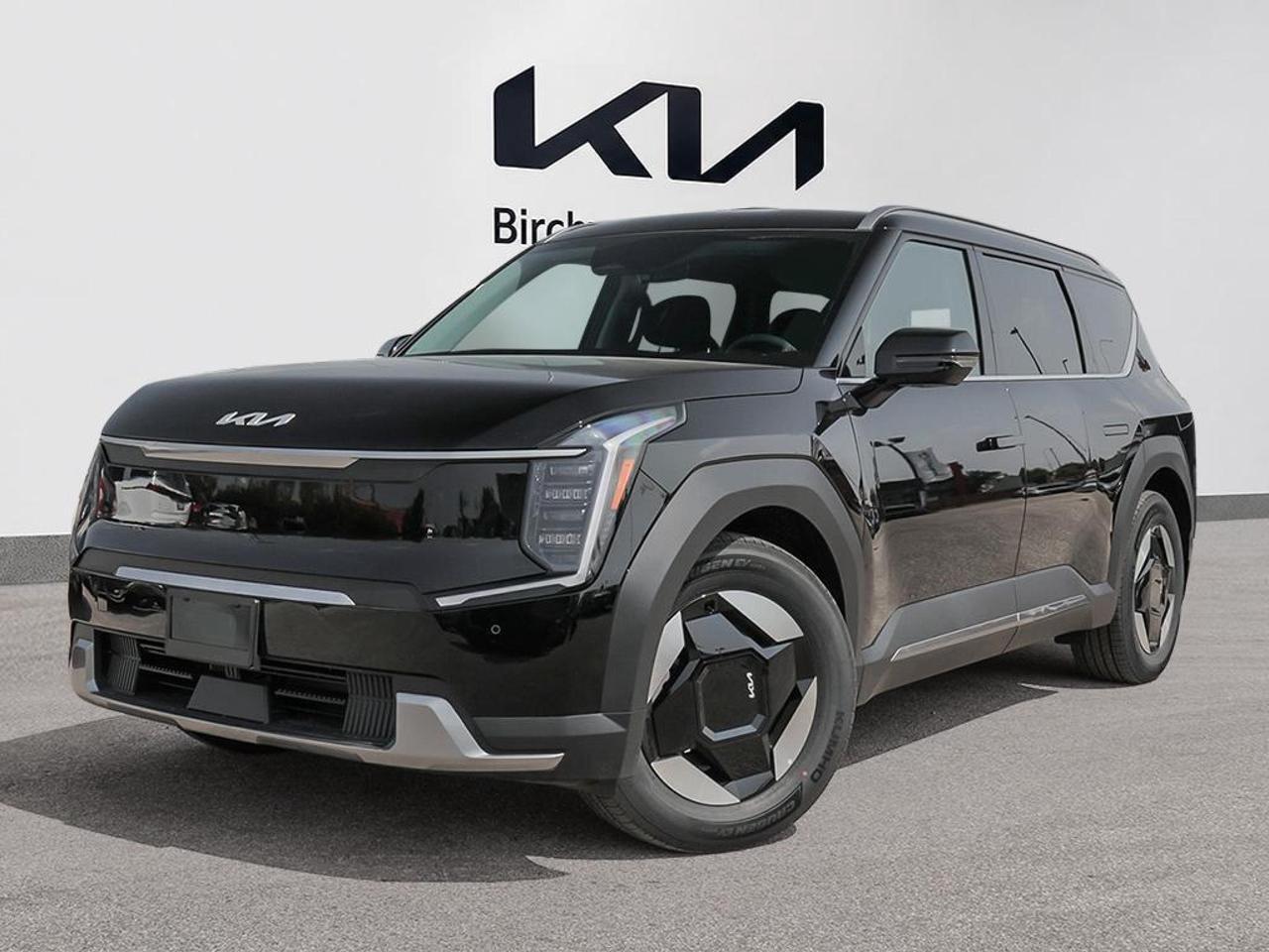 Experience is Everything at Birchwood Kia West!  It is our mission to provide the most transparent and time efficient sales process out of any Manitoba Kia Dealer!  Come visit us and see for yourself why we have a 4.4 star google rating!
The 2026 Kia EV9 Land in Aurora Black is one of the most capable and thoughtfully equipped electric SUVs on the road today. With a massive 99.8 kWh battery, dual-motor AWD, seating for up to seven, and a suite of premium comfort and driver-assist technologies, this is the EV that proves you dont have to compromise on space, capability, or refinement.

Key Features:
- 99.8 kWh Lithium-Ion battery with 10.9 kW onboard charger for faster, more flexible charging
- Dual-motor All-Wheel Drive for confident performance in all Manitoba weather conditions
- Heated & air-cooled front bucket seats with 8-way power adjustment and 2-way lumbar support
- Three-row seating: 40-20-40 second row and fold-flat 50-50 third row for versatile cargo and passenger configurations
- Highway Driving Assist (HDA) and Smart Cruise Control with Stop & Go for relaxed long-distance travel
- Blind-Spot Collision-Avoidance Assist, Rear Cross-Traffic Collision Avoidance, and Driver Monitoring Alert
- Heated leatherette steering wheel and auto-dimming rearview mirror for a refined daily experience
- 19 alloy wheels with aerodynamic covers optimizing EV range

Ready to experience the EV9 Land for yourself? Visit us at Birchwood Kia West or explore your options at birchwoodkiawest.ca. Reserve this vehicle, start your purchase online, or book a test drive today  our team is here to make the process straightforward and pressure-free.
ADDITIONAL ACCESSORIES INCLUDED: 

*Kia Genuine All-Weather Floor Mats
*Premium DEFA Block Heater
*Kia Genuine Wheel Locks
*Kia Genuine Touch-Up Paint

You might qualify for additional savings on your purchase! Ask us about our:

$500 Grad Program
$750 Mobility Assistance Program
$500 Military Benefit
1% Loyalty Rate Reduction 

FIND MORE INFORMATION AND VIEW MORE OPTIONS

*Visit us! Birchwood Kia West in the Birchwood Auto Park. Portage Ave & The Perimeter!
*Visit www.birchwoodkiawest.ca
*Contact our sales department at (204) 888-4542

*Whenever possible, the vehicle photos shown are of the ACTUAL vehicle. This provides the best online shopping experience for our valued customers.
*Price includes all options, fees, and levies. No additional charges are applied.
*Additional fees may apply to select finance and lease options. 
*Dealer Permit #4302
Dealer permit #4302