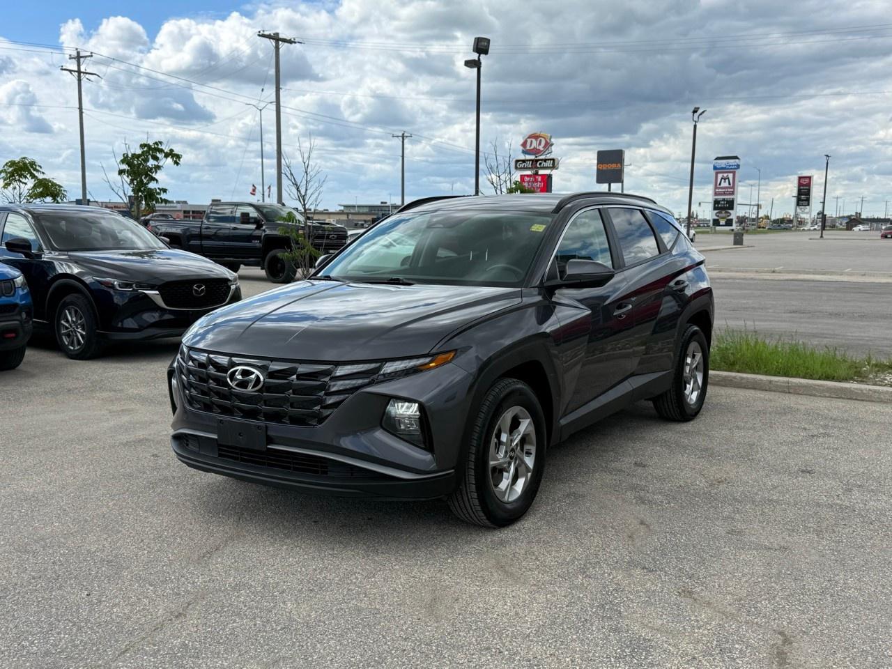 This 2024 Hyundai Tucson Preferred AWD delivers an exceptional blend of sharp styling and confident all-weather capability, powered by an efficient 187-horsepower 2.5L 4-cylinder engine and HTRAC All-Wheel Drive. The tech-savvy cabin treats passengers to a highly comfortable and modern driving environment, offering heated front seats, a heated steering wheel, a 10.25-inch touchscreen with navigation, and the comprehensive Hyundai SmartSense safety suite. Come by Highway Mazda today!