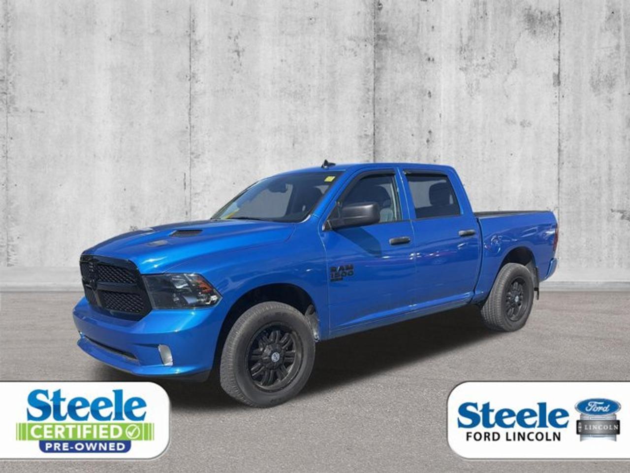 Built to handle daily work and weekend hauling, this 2022 RAM 1500 Classic Express delivers proven truck capability with a simple, bold design. Offered by Steele Ford Lincoln in Halifax, this used pickup pairs a Blue exterior with a Grey interior, four full doors, automatic transmission, and dependable 4x4 traction.With 70,563 km on the odometer, this 2022 RAM 1500 Classic Express offers solid value for drivers who want a full-size truck with practical comfort and trusted V-6 power. Its 3.6-litre regular unleaded engine is well known for smooth performance and useful everyday strength on the road.FEATURES OF THE 1500 Classic Express»» Blue exterior with clean truck presence»» Grey interior with practical cabin layout»» Four-door cab for easy passenger access»» Automatic transmission for simple daily drivingTRUCK FEATURES»» Four-wheel drive for added road confidence»» Pickup box supports work and weekend tasks»» Full-size truck design for versatile use»» V-6 power suited for light towingADVANCED SAFETY FEATURES»» Four-wheel drive adds traction in conditions»» Auto-dimming rearview mirror reduces night glare»» Four-door design supports easy passenger entry»» Full-size truck stance adds road presencePERFORMANCE AND EFFICIENCY»» 3.6-litre V-6 engine delivers smooth power»» Automatic transmission supports relaxed driving feel»» Regular unleaded fuel helps manage costs»» Balanced performance for work and travelCOMFORT AND CONVENIENCE»» Heated steering wheel for cold mornings»» Keyless entry adds everyday ease»» Power outlet supports devices on trips»» Spacious cabin suits daily truck useTECHNOLOGY AND CONNECTIVITY»» Satellite radio expands in-cabin entertainment choices»» Power outlet helps charge mobile devices»» Easy-to-use controls support quick access»» Auto-dimming mirror adds useful convenienceCARGO SPACE»» Pickup bed ready for gear hauling»» Full-size box helps carry larger items»» Cabin offers room for passengers too»» Versatile layout suits work and errandsAWARDS & RECOGNITIONS»» Best Buy Award, Consumer Guide Automotive, 2022WHAT OTHER OWNERS LIKE»» Smooth V-6 power for daily driving»» Useful four-wheel drive in changing weather»» Comfortable ride for a full-size truck»» Simple controls and practical cabin designThis 2022 RAM 1500 Classic Express stands out as a smart choice for drivers who need real truck function without unnecessary complexity. From Halifax commutes to jobsite duties and weekend projects, it brings the strength, comfort, and everyday usability that make a pickup such a valuable part of life in Atlantic Canada.This 2022 RAM 1500 Classic Expresss VIN is: 3C6RR7KG2NG257655 .