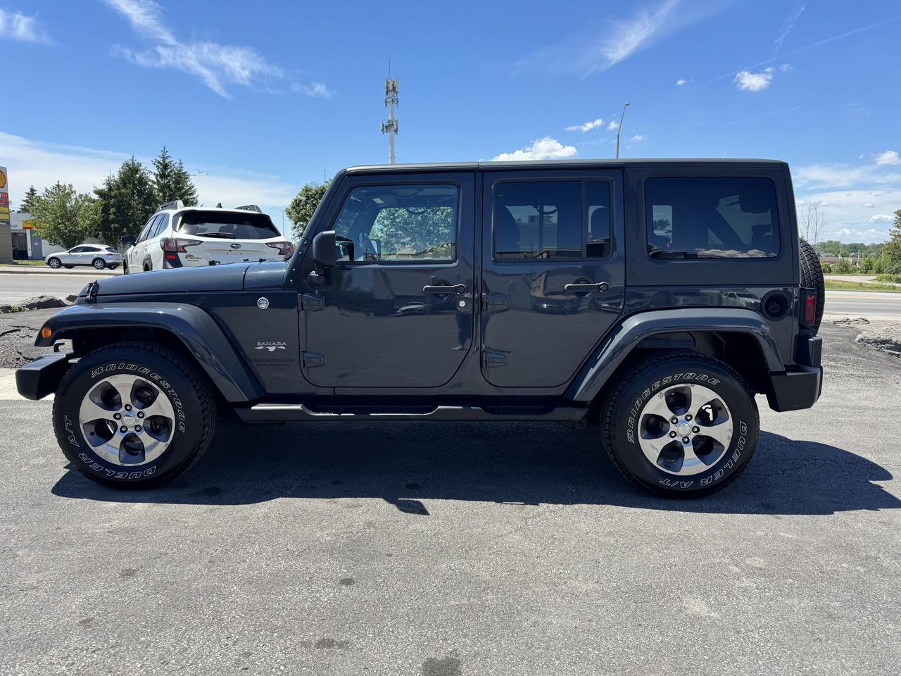 2016 Jeep WRANGLER UNLIMITED 4WD 4dr Sahara Photo
