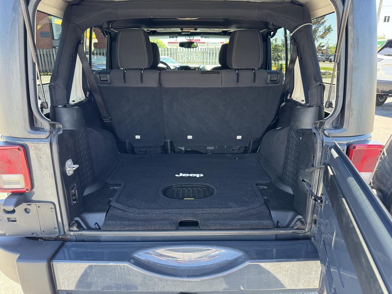 2016 Jeep WRANGLER UNLIMITED 4WD 4dr Sahara Photo
