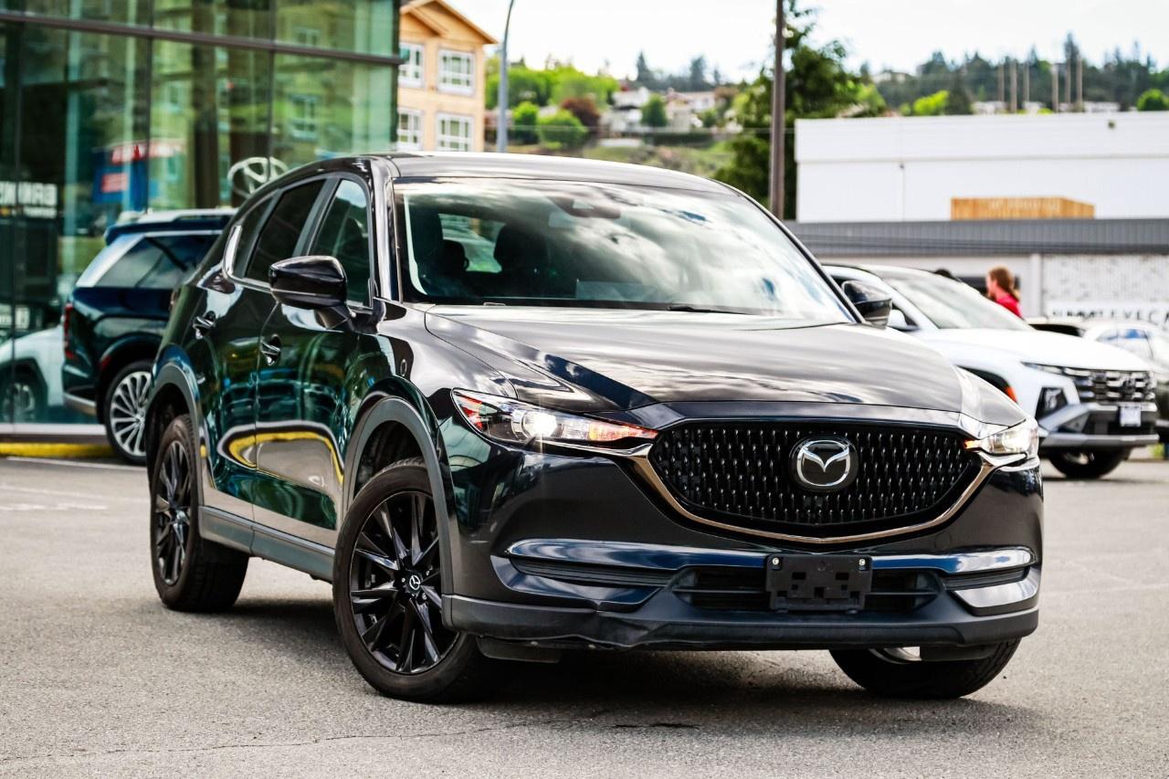 <p>Check out this <strong>2021.5 Mazda CX-5 Signature AWD</strong> finished in black  a premium SUV that blends upscale luxury, sporty performance, and refined comfort into one beautifully designed package. With <strong>low kilometres</strong>, <strong>one owner</strong>, and <strong>no accidents</strong>, this CX-5 Signature delivers an elevated driving experience perfect for BC road trips, mountain drives, and everyday commuting around Kamloops.</p><p>Equipped with <strong>All-Wheel Drive</strong>, this Mazda delivers confident handling through changing weather conditions and winding highways while still maintaining the responsive and engaging driving dynamics Mazda is known for. The <strong>Signature trim</strong> sits at the top of the CX-5 lineup and offers luxury-level refinement both inside and out.</p><p>Under the hood, the turbocharged engine delivers smooth acceleration and strong performance while maintaining excellent comfort for long-distance travel. Inside, the cabin features premium materials and upscale finishes throughout with features including <strong>heated and ventilated leather seats</strong>, <strong>heated rear seats</strong>, <strong>heated steering wheel</strong>, <strong>premium Bose audio system</strong>, <strong>Apple CarPlay</strong>, <strong>Android Auto</strong>, <strong>navigation</strong>, <strong>sunroof</strong>, <strong>wireless charging</strong>, <strong>dual-zone climate control</strong>, and advanced driver assistance technology for added confidence behind the wheel.</p><p>The spacious interior and flexible cargo area make it easy to pack luggage, outdoor gear, groceries, or road trip essentials while still enjoying a refined and quiet cabin experience.</p><p>This <strong>2021.5 Mazda CX-5 Signature AWD</strong> has undergone a comprehensive <strong>120-POINT INSPECTION</strong> by our certified technicians for added confidence and peace of mind.</p><p>Dealer #50285</p>