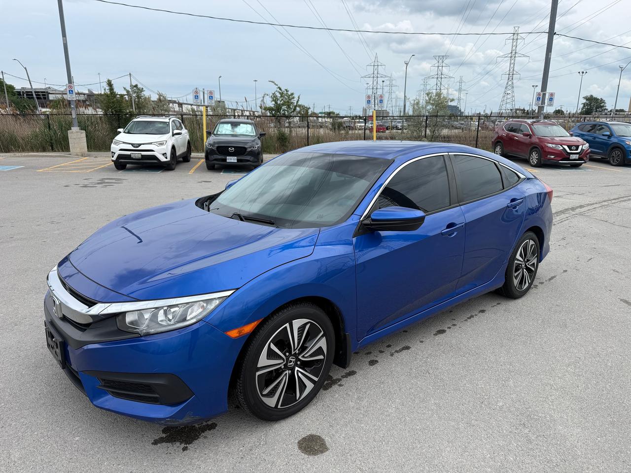<p>🚗 <strong>WE WANT YOUR TRADE-IN!</strong> 🚗</p><p>Looking to upgrade? At Select Auto Centre Ltd., were actively looking for quality trade-ins and paying top dollar. Whether youre driving a car, SUV, truck, or van, we make the trade-in process quick, easy, and hassle-free. Bring us your vehicle and let us show you how much its worth!</p><p>Now available is this exceptionally clean <strong>2017 Honda Civic LX</strong>, finished in a beautiful blue exterior with a black interior. With only <strong>88,778 KM</strong>, a <strong>great service history</strong>, <strong>alloy wheels</strong>, and <strong>fully certified</strong>, this Civic is the perfect combination of reliability, efficiency, and style.</p><p>Powered by Hondas fuel-efficient gasoline engine and smooth CVT automatic transmission, this Civic delivers an excellent driving experience while keeping fuel costs low. The spacious four-door sedan design offers comfort for the whole family and plenty of room for everyday life.</p><p><strong>Vehicle Highlights:</strong><br>✔ Only 88,778 KM<br>✔ Fully Certified<br>✔ Excellent Service History<br>✔ Alloy Wheels<br>✔ Backup Camera<br>✔ Bluetooth Connectivity<br>✔ Cruise Control<br>✔ Air Conditioning<br>✔ Power Windows, Locks & Mirrors<br>✔ Fuel-Efficient & Reliable Honda Engineering</p><p>Dont miss your chance to own one of Canadas most trusted and sought-after sedans.</p><p>📍 Select Auto Centre Ltd.<br>📞 416-841-7058</p><p><strong>Have a trade? We want it! Contact us today for a free appraisal and top-dollar trade-in value.</strong></p>
