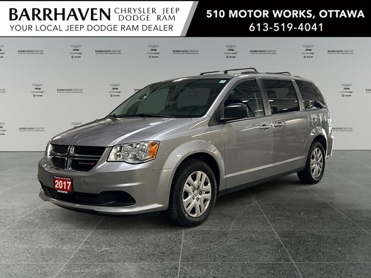 Introducing a sophisticated 2017 Dodge Grand Caravan SXT in a classic silver finish. With its front-wheel-drive handling and robust stance, this van is perfect for smooth city cruising and highway travel. The exterior shines with body-colour bodyside mouldings and door handles that provide a cohesive look. Integrated roof rail crossbars expand utility, and sunscreen glass ensures privacy and UV protection. Inside, experience comfort and convenience with the second and third row StowN Go seats, allowing for flexible transport and storage solutions. The 2nd row features StowN Go bucket seats to maximize passenger space, and a floor console with a cupholder adds to your travel convenience. Equipped with advanced technology, the 2017 Grand Caravan includes keyless entry for easy access and power windows for a touch of comfort. Air conditioning guarantees a pleasant climate on every journey. Safety remains a priority with brake assist and heated mirrors enhancing visibility in challenging conditions. This Dodge Grand Caravan SXT is ideal for families and adventure seekers who require ample space and versatility. Contact Barrhaven Jeep Dodge Chrysler Ram to learn more and arrange a test drive today. Discover how this vehicle can meet your lifestyle needs.