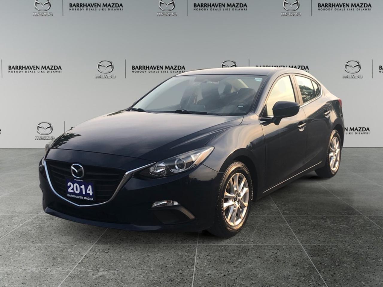 Experience the 2014 Mazda Mazda3 GS-SKY in a captivating blue finish, a vehicle that merges a manual transmission with precise front-wheel drive to ensure an engaging and responsive drive. This elegant sedan presents a well-balanced aesthetic with stylish alloy wheels that enhance its dynamic look. The interior is appointed with practical features such as air conditioning and power windows, ensuring your comfort on every journey. Additionally, keyless entry adds a touch of modern convenience. Stay connected and safe with advanced technology, including a Bluetooth connection for seamless integration with your devices. The backup camera aids in safer parking, while cruise control and brake assist provide additional driving ease and peace of mind. Perfect for driving enthusiasts or those looking for a reliable commuter car, the 2014 Mazda3 ensures a memorable ride with its blend of style and functionality. Dont miss the opportunity to learn more about this exceptional vehicle. Contact Barrhaven Mazda today for more information!