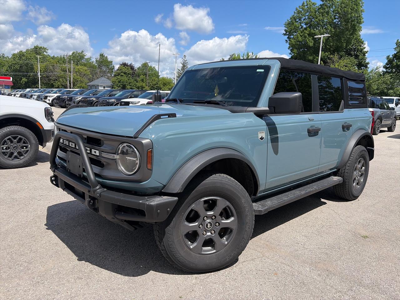 <p>Get ready for adventure with this rugged and capable 2022 Ford Bronco Big Bend 4 Door 4x4, now available at Winegard Ford! With only 73,612 kilometers on the odometer, this pre-owned gem is eager to hit the trails and explore Canadas diverse landscapes. Its iconic design, coupled with the legendary Bronco off-road prowess, makes it the perfect companion for both daily commutes and weekend getaways. Whether youre navigating city streets or venturing off the beaten path, this Bronco is built to impress and perform.</p><p>&nbsp;</p><p>This 2022 Ford Bronco Big Bend is more than just a vehicle; its an invitation to experience freedom and capability. The 4x4 system, paired with its robust construction and off-road suspension, ensures you can tackle any terrain with confidence. Inside, youll find a thoughtfully designed cabin with features that enhance both comfort and convenience, making every drive an enjoyable experience. Come down to Winegard Ford and see for yourself why this Bronco is the ultimate SUV for those who crave adventure.</p><p>&nbsp;</p><p>Here are 5 sizzling features of this 2022 Ford Bronco Big Bend:</p><p><br><br></p><ul><li><strong>Part-Time Four-Wheel Drive with Electronic Transfer Case:</strong> Conquer any terrain with confidence. This system provides the ultimate traction and control, whether youre on slippery roads or tackling challenging off-road trails.</li></ul><p>&nbsp;</p><ul><li><strong>Removable Rear Window & Manual Convertible Top:</strong> Experience the thrill of open-air driving! Easily remove the rear window and top for an unparalleled connection to the outdoors, perfect for sunny days and scenic routes.</li></ul><p>&nbsp;</p><ul><li><strong>Ford Co-Pilot360&trade; - Pre-Collision Assist with Pedestrian Detection & Autolamp Auto On/Off Reflector LED Low/High Beam Auto High-Beam Headlamps:</strong> Drive with enhanced peace of mind. This suite of advanced safety features helps protect you and those around you, while the automatic high beams ensure optimal visibility at night.</li></ul><p>&nbsp;</p><ul><li><strong>Off-Road Suspension & Gas-Pressurized Shock Absorbers:</strong> Engineered for adventure. This Bronco is built to handle rough terrain with a suspension system designed for superior performance and a smooth ride, no matter how challenging the path.</li></ul><p>&nbsp;</p><ul><li><strong>2.3L EcoBoost&reg; I-4 Engine:</strong> Unleash powerful performance. This turbocharged engine delivers exhilarating acceleration and impressive capability, ensuring you have the power you need for both on-road and off-road excursions.</li></ul><p><br><br></p><p><strong><em>Powered by AutoIntelligence&trade;</em></strong></p><p>&nbsp;</p><p>Vehicle information has been generated using artificial intelligence and is provided for informational purposes only. While efforts are made to ensure accuracy, please confirm all details directly with the dealer.</p><p>&nbsp;</p>