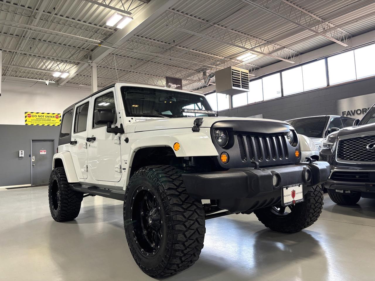 2016 Jeep Wrangler Unlimited Sahara|4X4|V6|MANUAL|NAV|ALPINE|FUELWHEELS|MICKEYS Photo