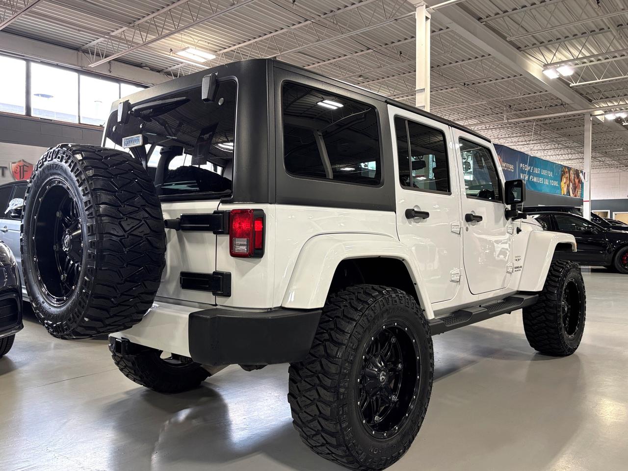 2016 Jeep Wrangler Unlimited Sahara|4X4|V6|MANUAL|NAV|ALPINE|FUELWHEELS|MICKEYS Photo