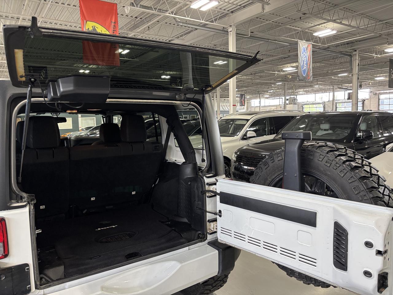 2016 Jeep Wrangler Unlimited Sahara|4X4|V6|MANUAL|NAV|ALPINE|FUELWHEELS|MICKEYS Photo