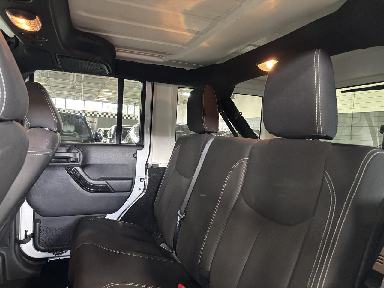 2016 Jeep Wrangler Unlimited Sahara|4X4|V6|MANUAL|NAV|ALPINE|FUELWHEELS|MICKEYS Photo