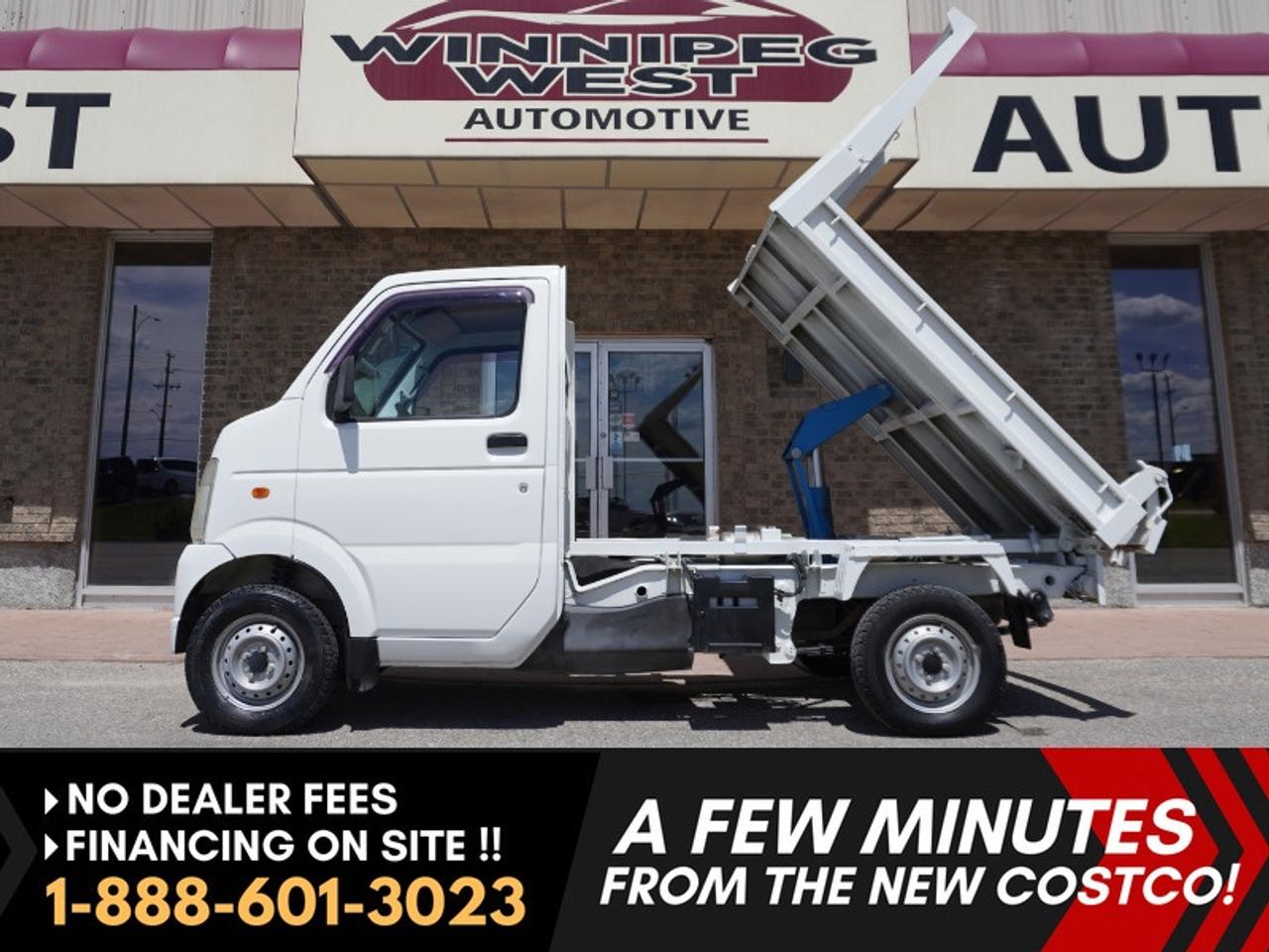 * * WOW!!!    four wheel drive and an electric Dump box!!  Very rare find!!  LOW KM!! 29.000 KMS!!  * * 2010 Suzuki Carry (DA63T generation) Kei truck w/ powered hydraulic dump box - - Headache rack - - 4WD - - Selective High/Low range gearing - - 5-Speed Manual - -   Multi-point electronic fuel injection (EFI) - - A/C and heating system - - Louvers - - Digital gauge cluster. 

DA63T Model. Clean exterior. Practical cabin for a compact "kei" truck, with capacity for 2 people. 

Hydraulic Dump Bed with a heavy-duty factory hydraulic lift!  Perfect for contractor or farm use! Great value with only 29,000 KMS!!!   Great vehicle to advertise with and have your company decals on!!   cheaper than a side by side ATV!!!   

Features
- 5-Speed Manual Transmission
- 4WD
- Selective High/Low range gearing
- 658 cc K6A inline 3-cylinder
- 2-valve DOHC
- Hydraulic tipping bed
- Headache rack
- Cargo tie downs
- Multi-point electronic fuel injection (EFI)
- Factory Air Conditioning and heating system
- Window louvers
- Manual windows
- AM/FM Radio
- Heavy-duty coil springs in the front 
- Leaf springs in the rear
- Payload Capacity: 350 kg to 450 kg 
- 12" Toyo Tires
-  Manual folding mirrors
- Storage pockets behind seats
