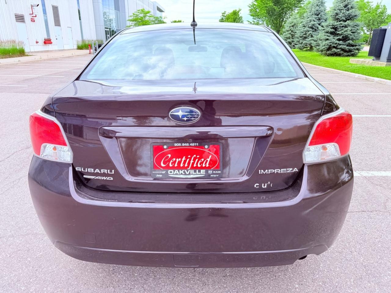 2012 Subaru Impreza 2.0i Premium 4dr Sedan AWD (2.0L 4cyl CVT) Photo4