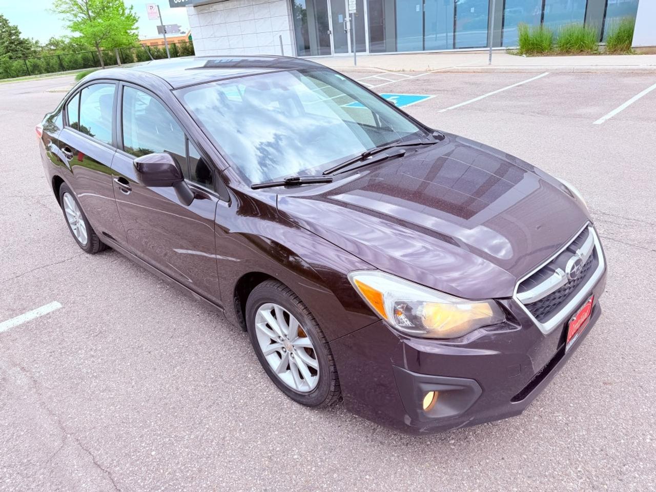 2012 Subaru Impreza 2.0i Premium 4dr Sedan AWD (2.0L 4cyl CVT) Photo2