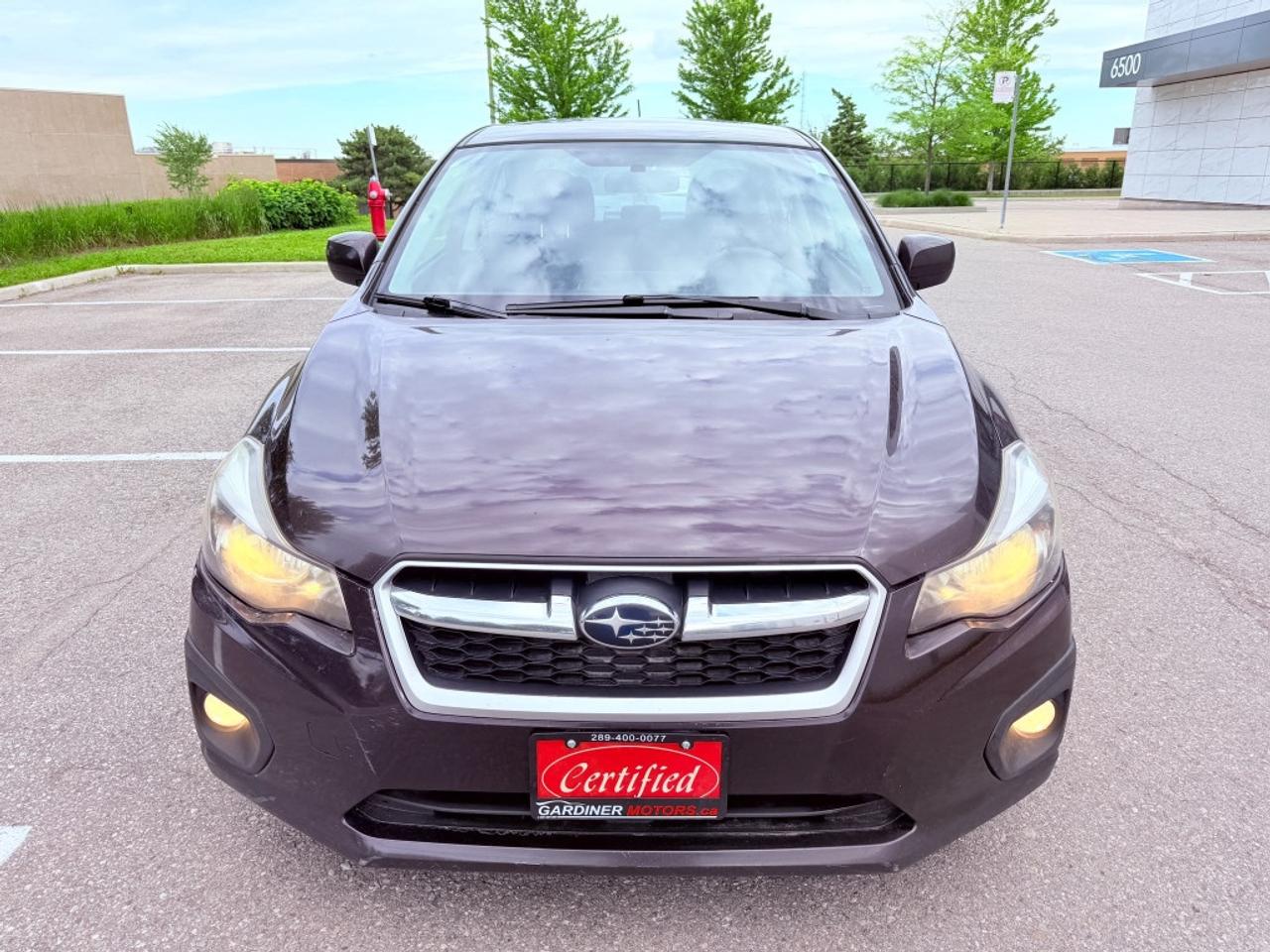 2012 Subaru Impreza 2.0i Premium 4dr Sedan AWD (2.0L 4cyl CVT) Photo