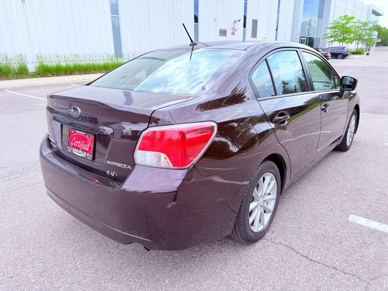2012 Subaru Impreza 2.0i Premium 4dr Sedan AWD (2.0L 4cyl CVT) Photo