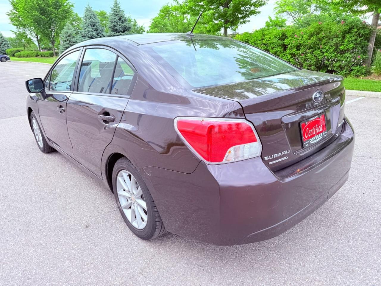 2012 Subaru Impreza 2.0i Premium 4dr Sedan AWD (2.0L 4cyl CVT) Photo