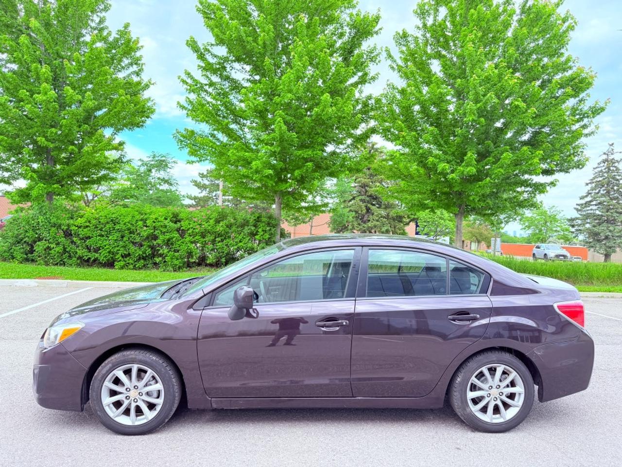 2012 Subaru Impreza 2.0i Premium 4dr Sedan AWD (2.0L 4cyl CVT) Photo