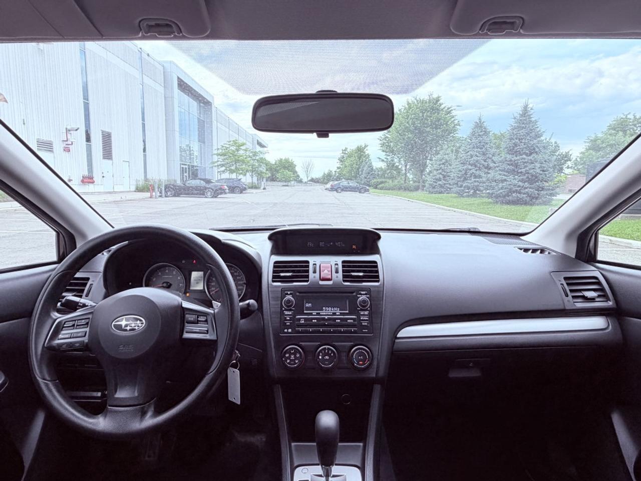2012 Subaru Impreza 2.0i Premium 4dr Sedan AWD (2.0L 4cyl CVT) Photo