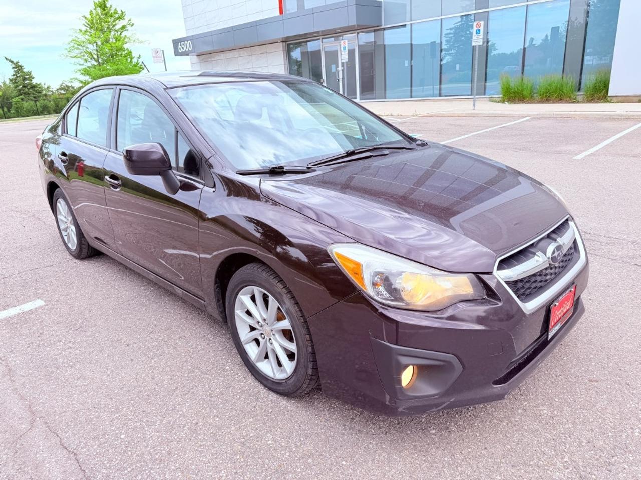 2012 Subaru Impreza 2.0i Premium 4dr Sedan AWD (2.0L 4cyl CVT) Photo