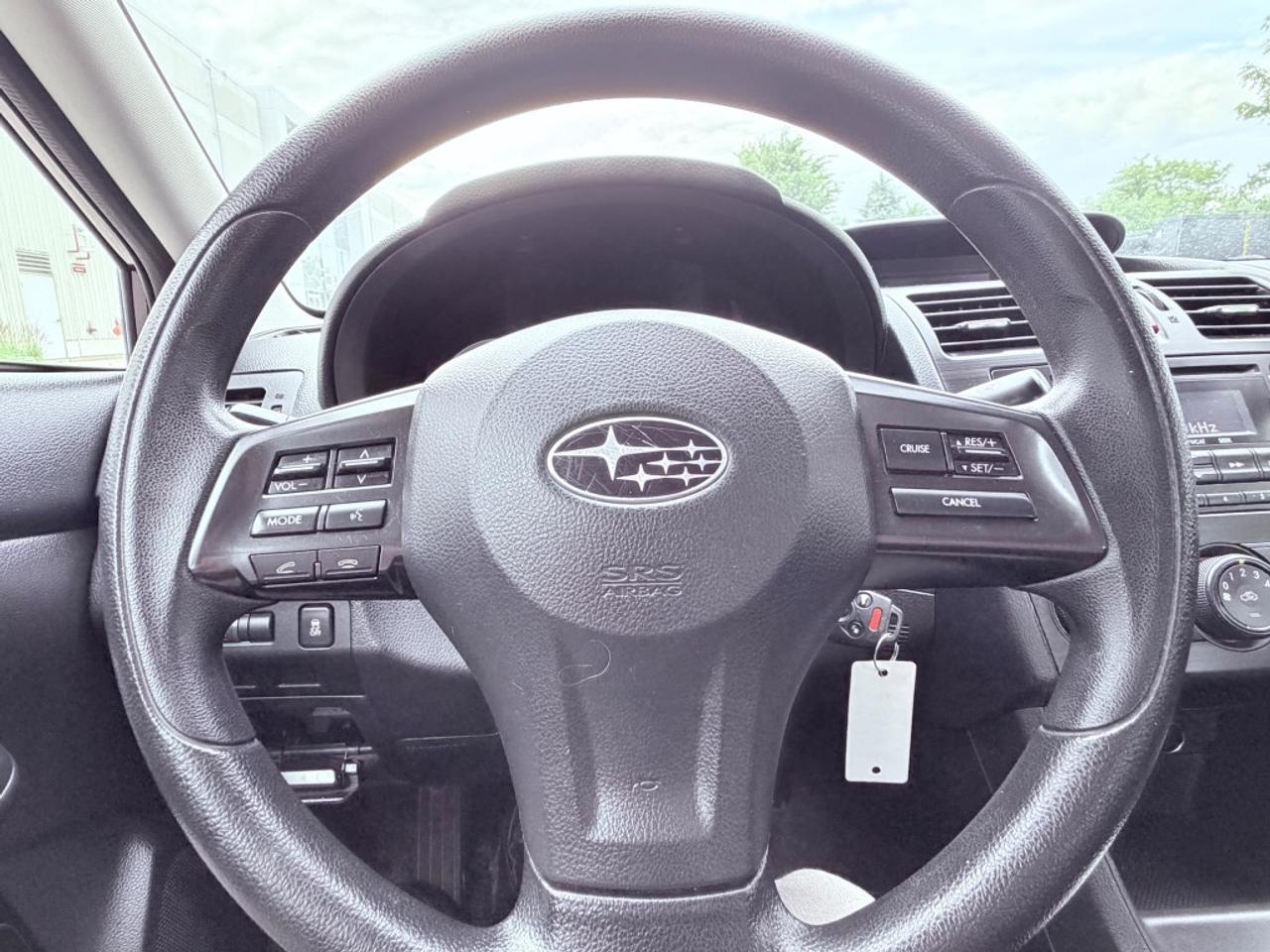 2012 Subaru Impreza 2.0i Premium 4dr Sedan AWD (2.0L 4cyl CVT) Photo