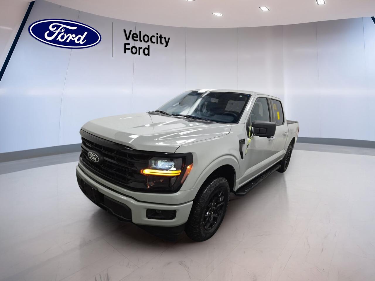 // SINGLE OWNER! //

Meet this used 2024 Ford F-150 XLT 4WD SuperCrew 5.5 Box at Velocity Ford in Moose Jaw. It has had one owner, as reported by CARFAX Canada. With its White exterior, Black interior, automatic transmission, and efficient 2.7-litre unleaded engine, this truck is ready for work and daily driving.

This 2024 Ford F-150 XLT 4WD SuperCrew 5.5 Box shows 77,562 km on the odometer and delivers the versatility drivers want from a full-size pickup. Four full doors, four-wheel drive, off-road tires, and a strong 4,671-kg towing capacity make it a smart choice for hauling, commuting, and weekend use.

FEATURES OF THE F-150 XLT 4WD SuperCrew 5.5 Box
»» Spacious SuperCrew cabin with four doors
»» 5.5-foot box for versatile cargo hauling
»» Four-wheel drive for added traction
»» 2.7-litre engine with automatic transmission

TRUCK FEATURES
»» Tows up to 4,671 kg confidently
»» Rear tow hook adds useful utility
»» Side steps ease cabin entry
»» Off-road tires support rugged driving

ADVANCED SAFETY FEATURES
»» Backup camera helps with reversing views
»» Lane departure warning adds driving confidence
»» Blind spot monitor supports safer lane changes
»» Multiple airbags enhance occupant protection

PERFORMANCE AND EFFICIENCY
»» 2.7-litre unleaded engine balances strong performance
»» Automatic transmission delivers smooth shifting response
»» Dual shift mode adds control
»» Four-wheel drive improves traction year-round

COMFORT AND CONVENIENCE
»» Dual-zone climate control improves cabin comfort
»» Power driver seat includes lumbar support
»» Passenger lumbar support adds ride comfort
»» Power windows and door locks included

TECHNOLOGY AND CONNECTIVITY
»» Navigation system helps guide every trip
»» Bluetooth integration supports hands-free communication
»» Wi-Fi hotspot keeps devices connected
»» Steering wheel audio controls add convenience

CARGO SPACE
»» 5.5-foot box handles daily hauling needs
»» Rear access supports easier loading tasks
»» Spare tire adds practical peace of mind
»» SuperCrew cabin offers useful interior storage

AWARDS & RECOGNITIONS
»» North American Truck of the Year, 2024
»» Best Buy Award, The Car Guide, 2024

WHAT OTHER OWNERS LIKE
»» Strong towing ability for everyday truck duties
»» Spacious cabin with useful rear seating
»» User-friendly technology and clear controls
»» Confident ride with four-wheel drive

This 2024 Ford F-150 XLT 4WD SuperCrew 5.5 Boxs VIN is: 1FTEW3LP9RKD32079.