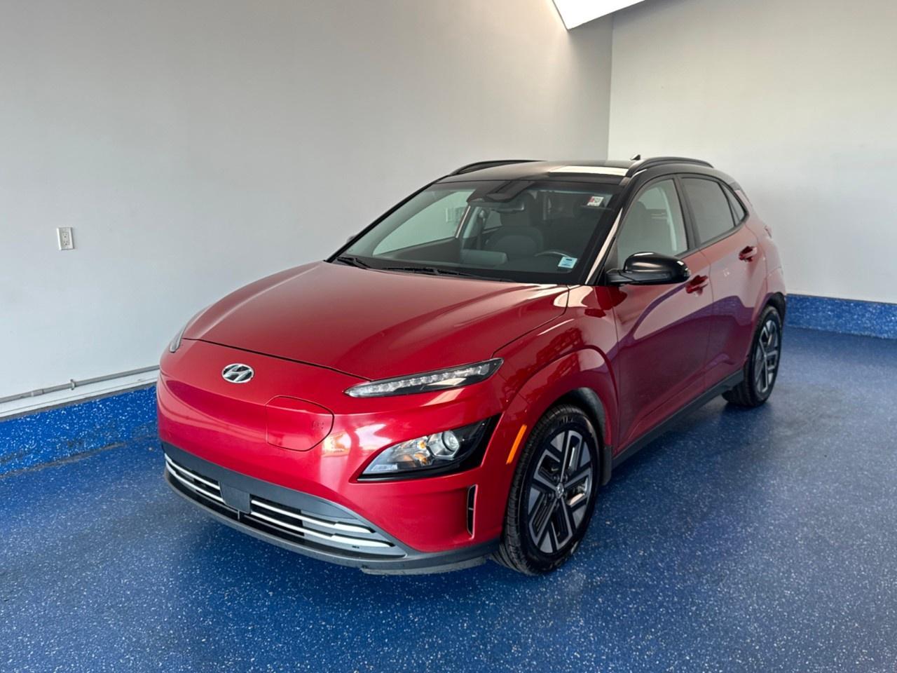 New Price! 2023 Hyundai Kona Electric Preferred w/Two Tone Electric Preferred w/Two Tone | Save your Gas Mone Certified. 1-Speed Automatic FWD Pulse Red w/Black Roof Electric Motor<br /><br /><br />17''' x 7.0J Aluminum Alloy Wheels, Air Conditioning, Alloy wheels, AM/FM radio: SiriusXM, Apple CarPlay & Android Auto, Automatic temperature control, Electronic Stability Control, Fully automatic headlights, Heated door mirrors, Heated Front Bucket Seats, Heated steering wheel, Leather steering wheel, Navigation System, Power windows, Rear Parking Sensors, Rear window wiper, Remote keyless entry, Split folding rear seat, Telescoping steering wheel, Tilt steering wheel, Turn signal indicator mirrors.<br /><br />Certification Program Details: Fresh 2 Yr MVI | 30 day warranty* | 110 point inspection | Full tank of fuel | Krown rustproofed | Flexible financing options | Professionally detailed<br /><br />This vehicle is Zacks Certified! You're approved! We work with you. Together we'll find a solution that makes sense for your individual situation. Please visit us or call 902 843-3900 to learn about our great selection.<br /><br />With 22 lenders available Zack's Auto Sales can offer our customers with the lowest available interest rate. Thank you for taking the time to check out our selection!