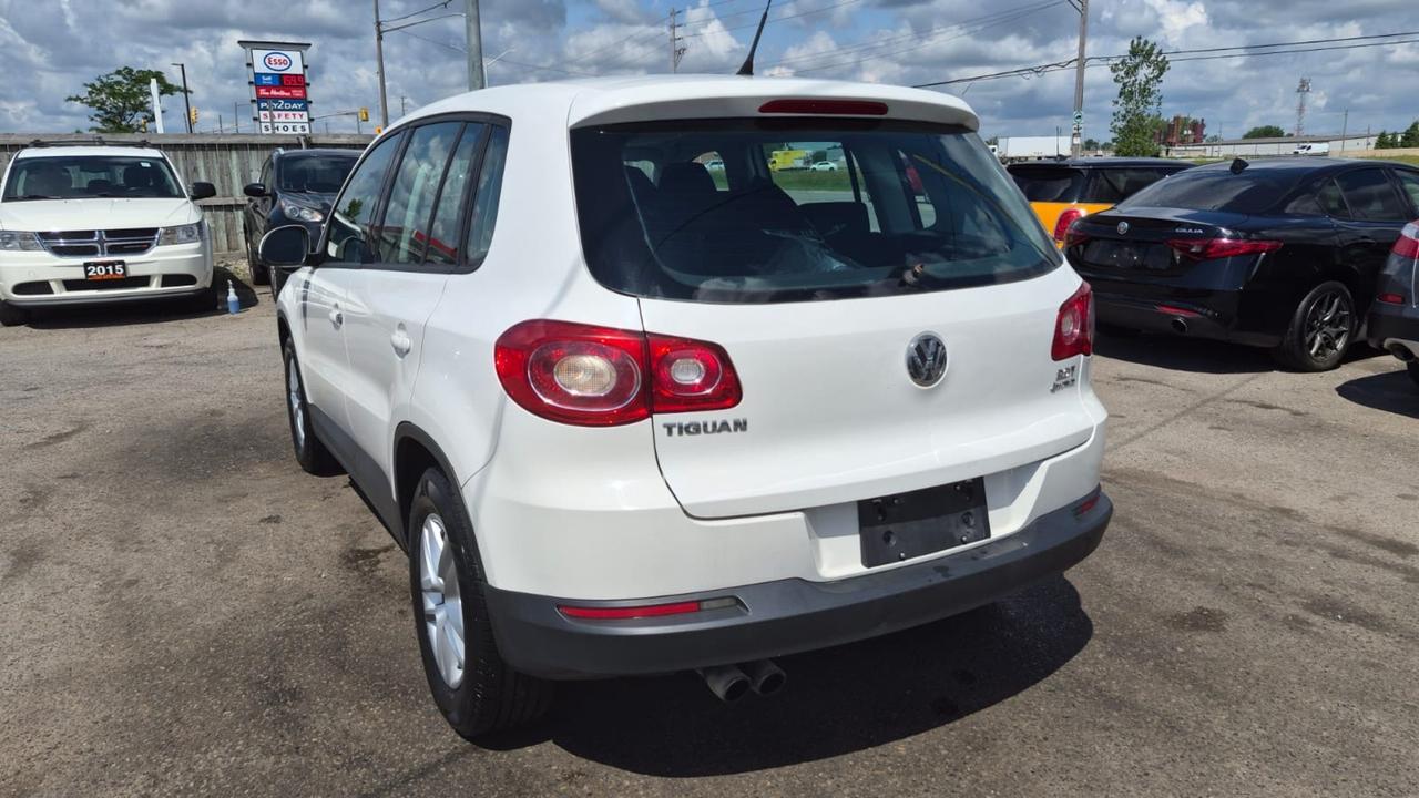 2010 Volkswagen Tiguan TRENDLINE, AUTO, 4 CYL, 4WD, AS IS SPECIAL Photo