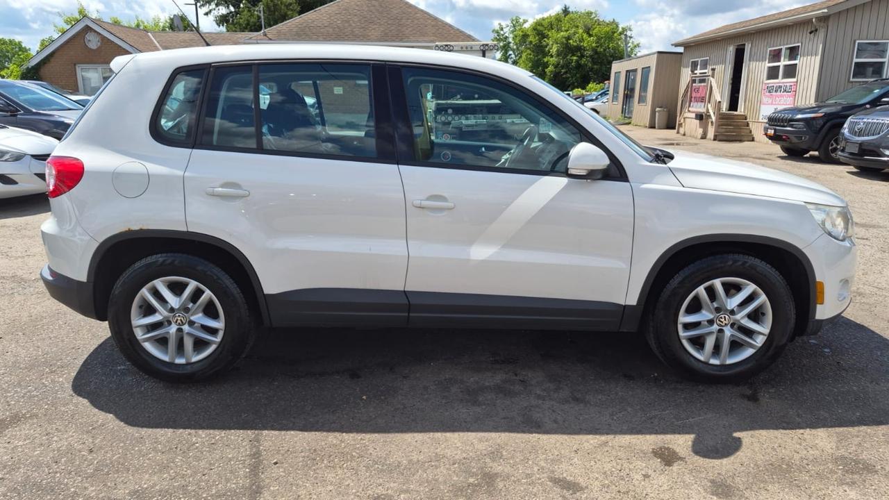 2010 Volkswagen Tiguan TRENDLINE, AUTO, 4 CYL, 4WD, AS IS SPECIAL Photo