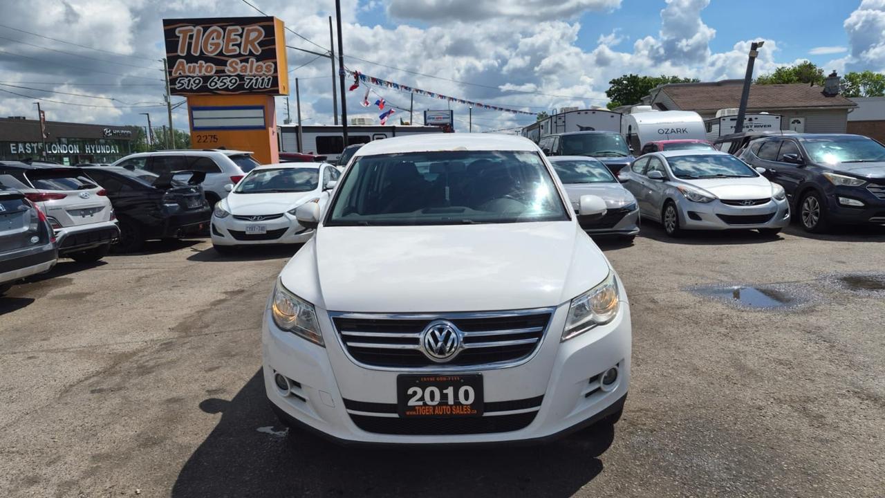 2010 Volkswagen Tiguan TRENDLINE, AUTO, 4 CYL, 4WD, AS IS SPECIAL Photo