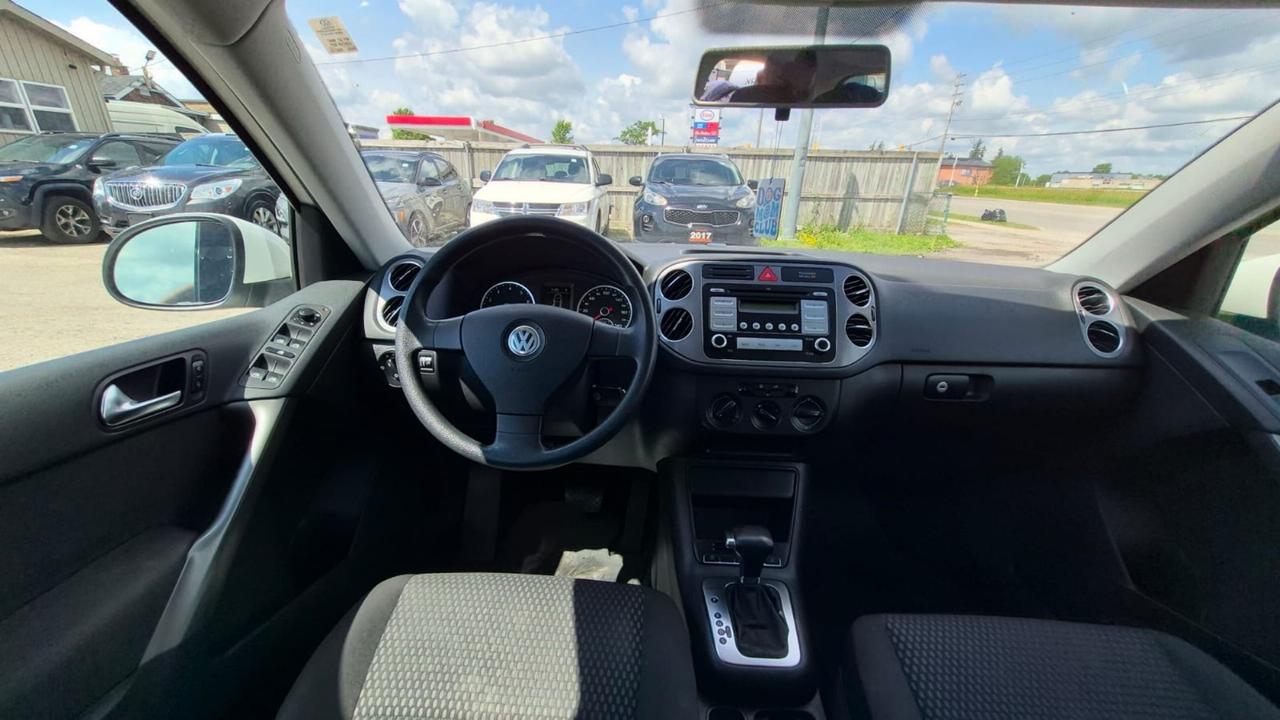 2010 Volkswagen Tiguan TRENDLINE, AUTO, 4 CYL, 4WD, AS IS SPECIAL Photo